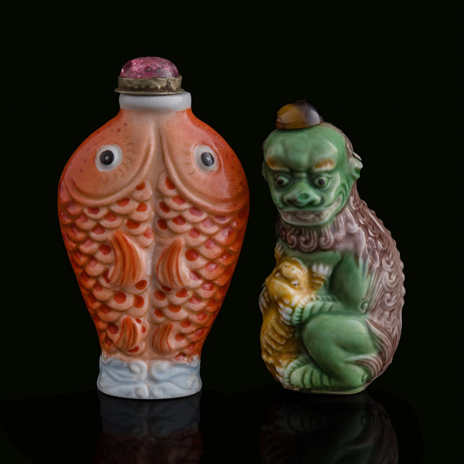 A Chinese famille rose lion-form snuff bottle and a twin-fish-form snuff bottle, 19th century (1 of 9)