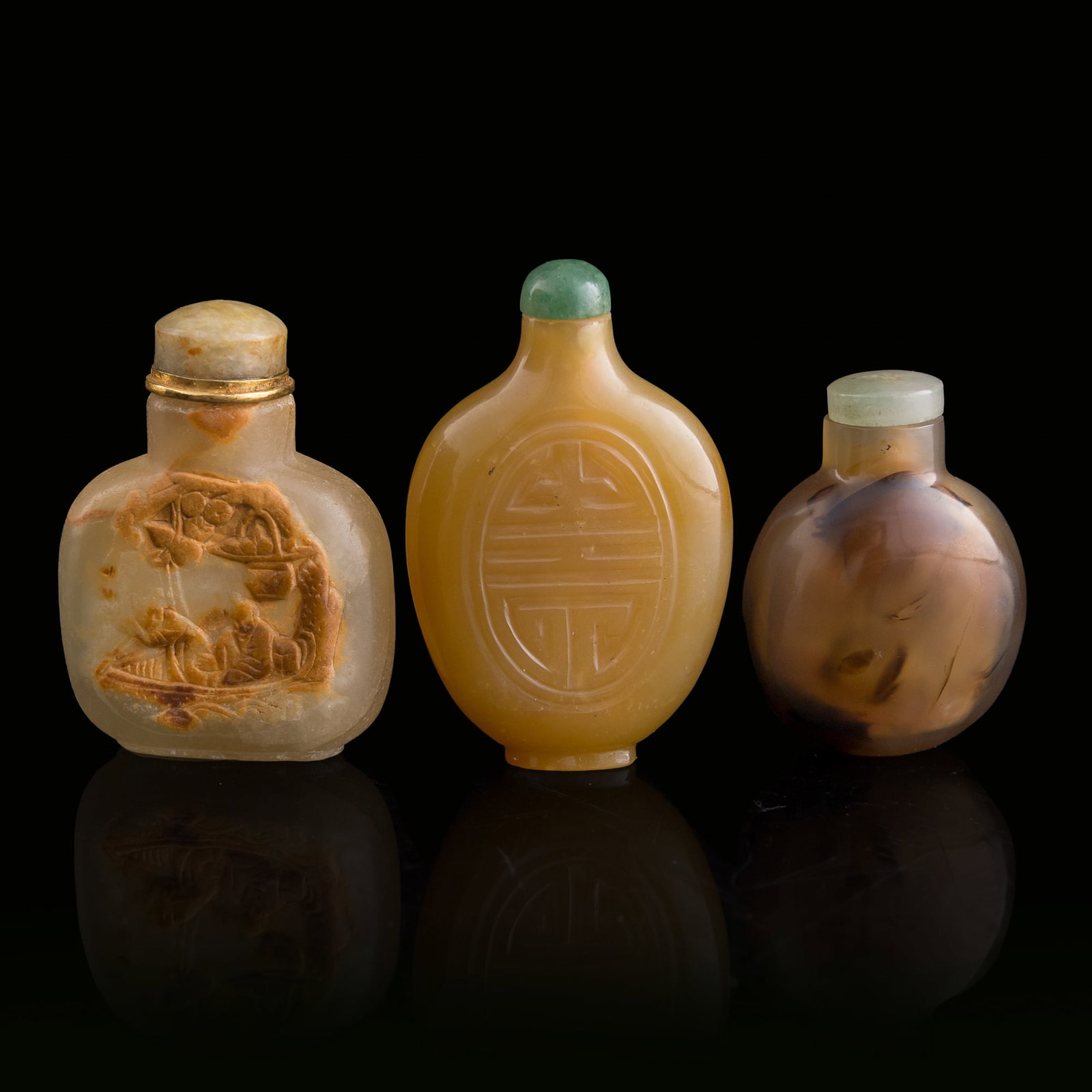 Three Chinese agate snuff bottles, Qing dynasty: Three Chinese agate snuff bottles Qing dynasty H: 2 1/2, W: 1 5/8, D: 1/2 in. (H: 6.4, W: 4.1, D: 1.3 cm. (largest)) From the estate of Mr. Perry, Jacksonville, Florida.