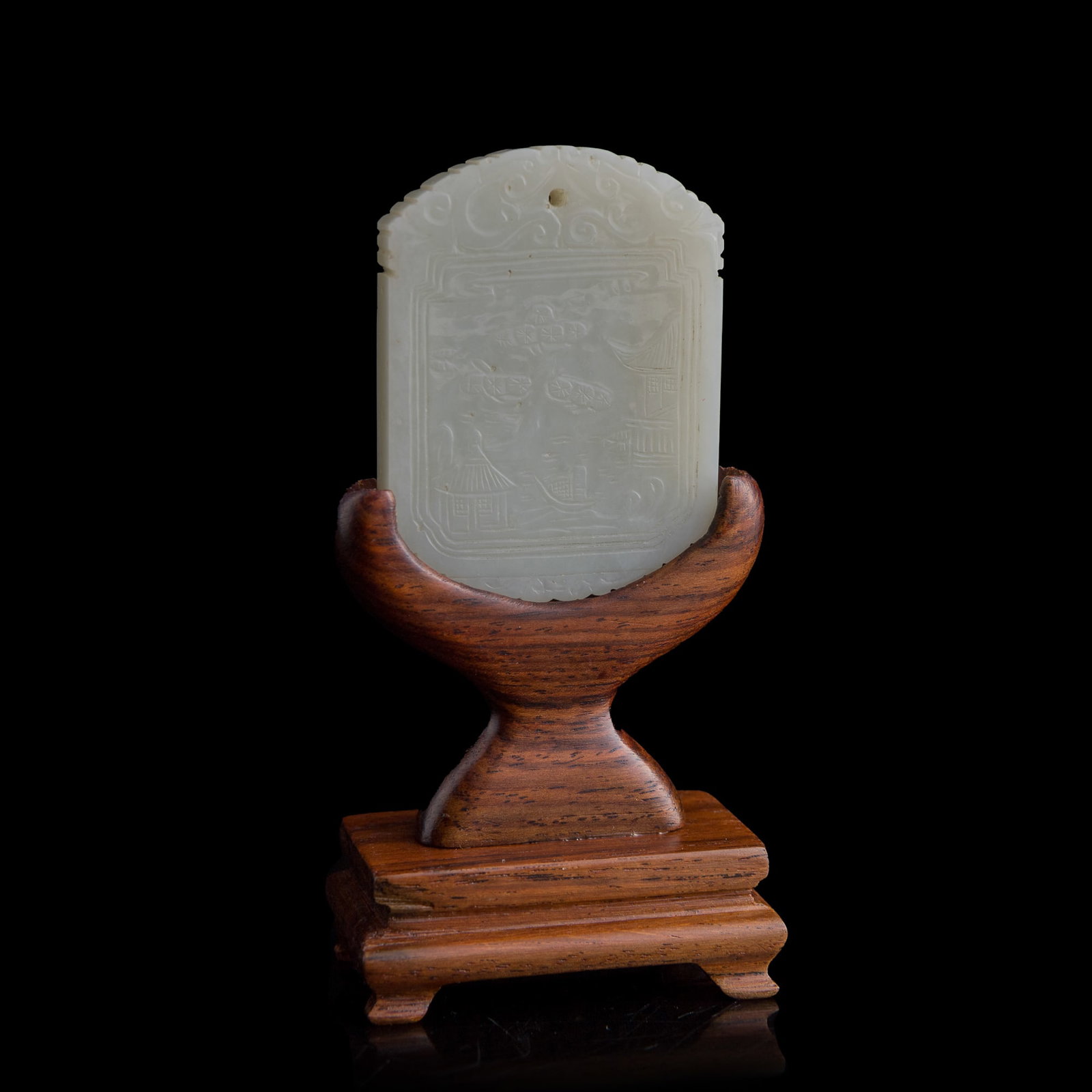 A Chinese carved white jade 'landscape' and 'inscription' plaque, late 18th/early 19th century: A Chinese carved white jade 'landscape' and 'inscription' plaque late 18th/early 19th century Sold with associated wooden stand. H: 2 1/8, W: 1 5/8, D: 1/4 in. (H: 5.4, W: 4.1, D: 0.6 cm. (jade))