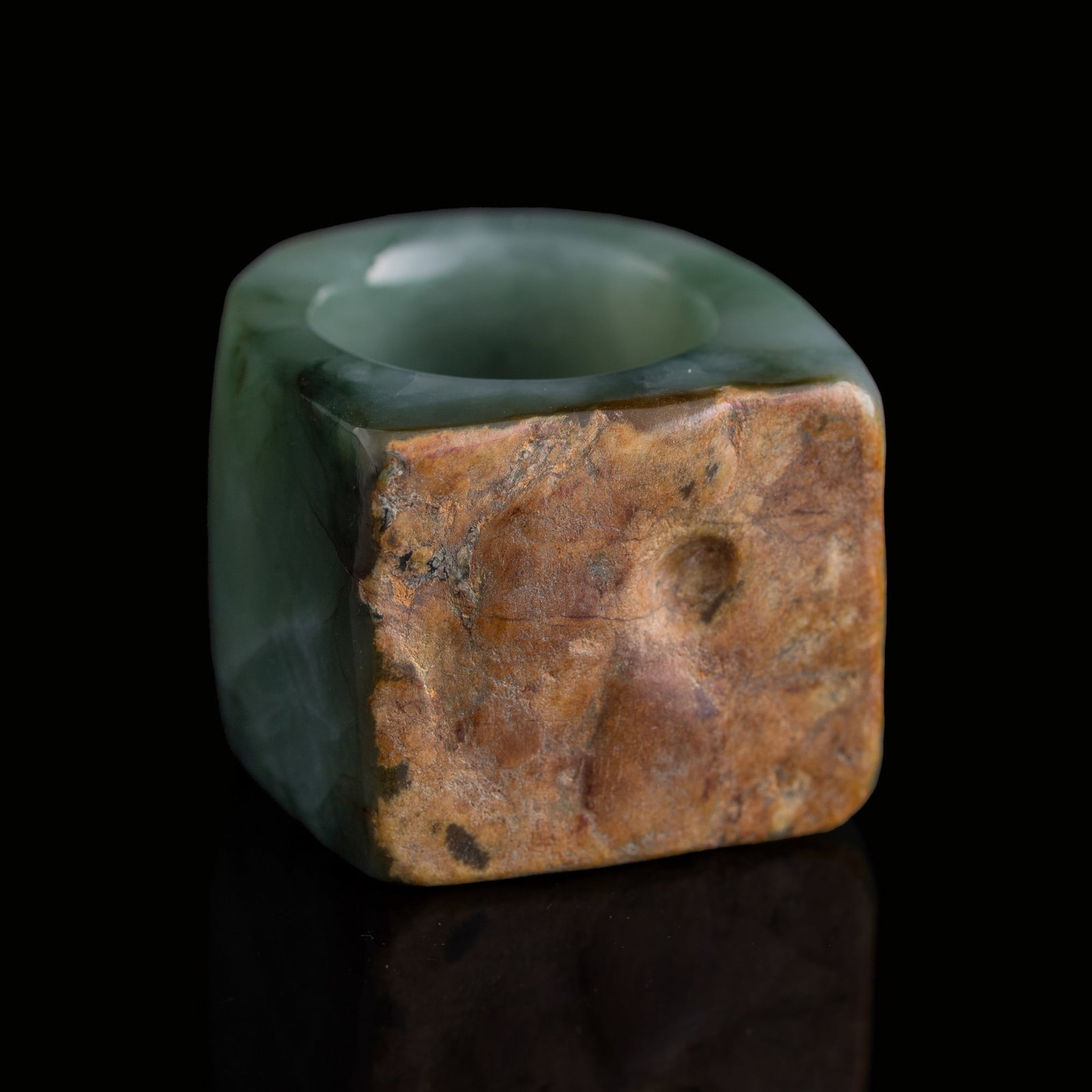 A Chinese jadeite archer's ring, Qing dynasty: A Chinese jadeite archer's ring Qing dynasty Inner Dia.: 22.9 mm, H: 27.9 mm From Mrs. Kiang in Newport Coast, California; collected by her late husband. Click here for high resolution images.