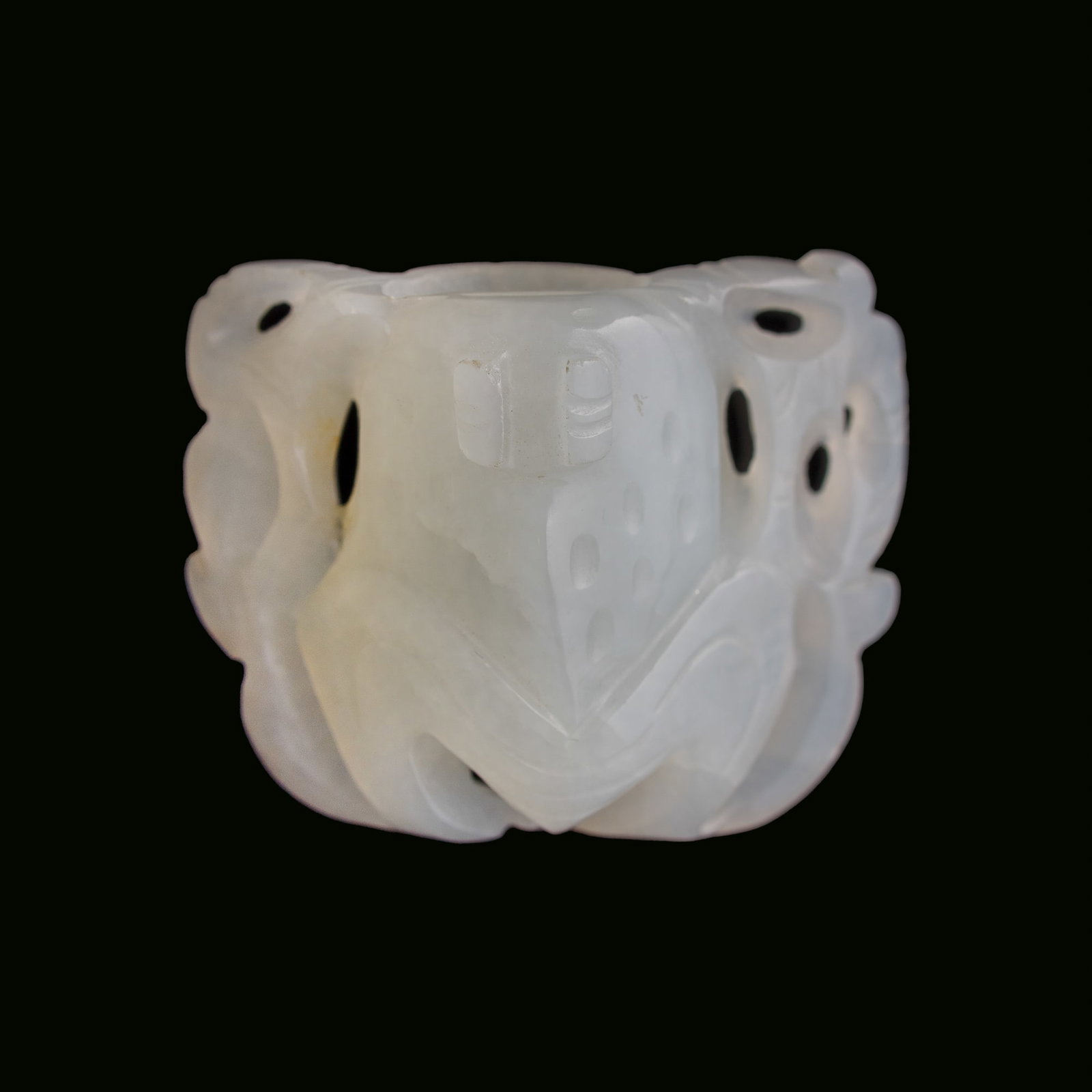 A Chinese carved white jade pendant of a frog, 19th century: A Chinese carved white jade pendant of a frog 19th century H: 1 1/4, W: 1 1/2, D: 3/4 in. (H: 3.2, W: 3.8, D: 1.9 cm.) From Mrs. Kiang in Newport Coast, California; collected by her late husband.