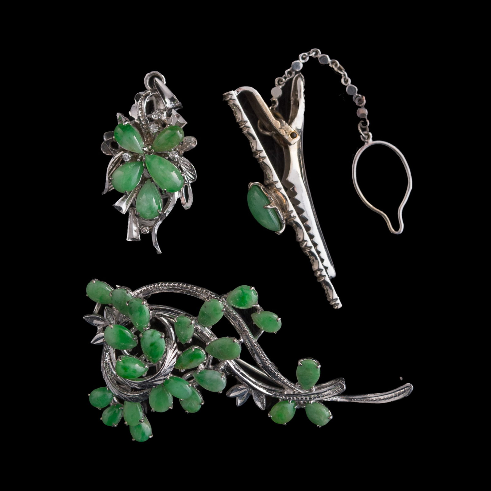 Two Chinese jadeite-set metal brooches and a tie clip (1 of 6)