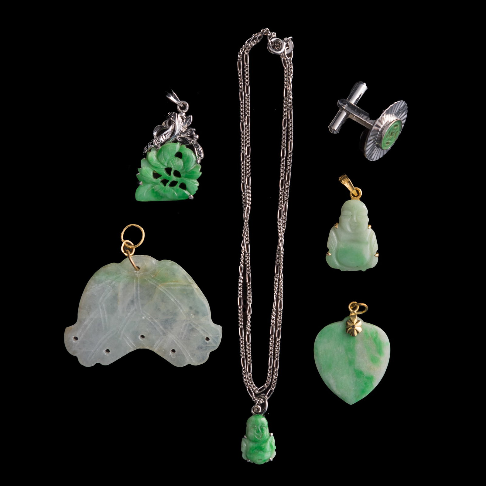 Six assorted Chinese jadeite ornaments: Six assorted Chinese jadeite ornaments H: 1 1/4, W: 1 3/4, D: 1/8 in. (H: 3.2, W: 4.4, D: 0.3 cm. (largest)) From Mrs. Ong in Huntington Beach, California. Clic