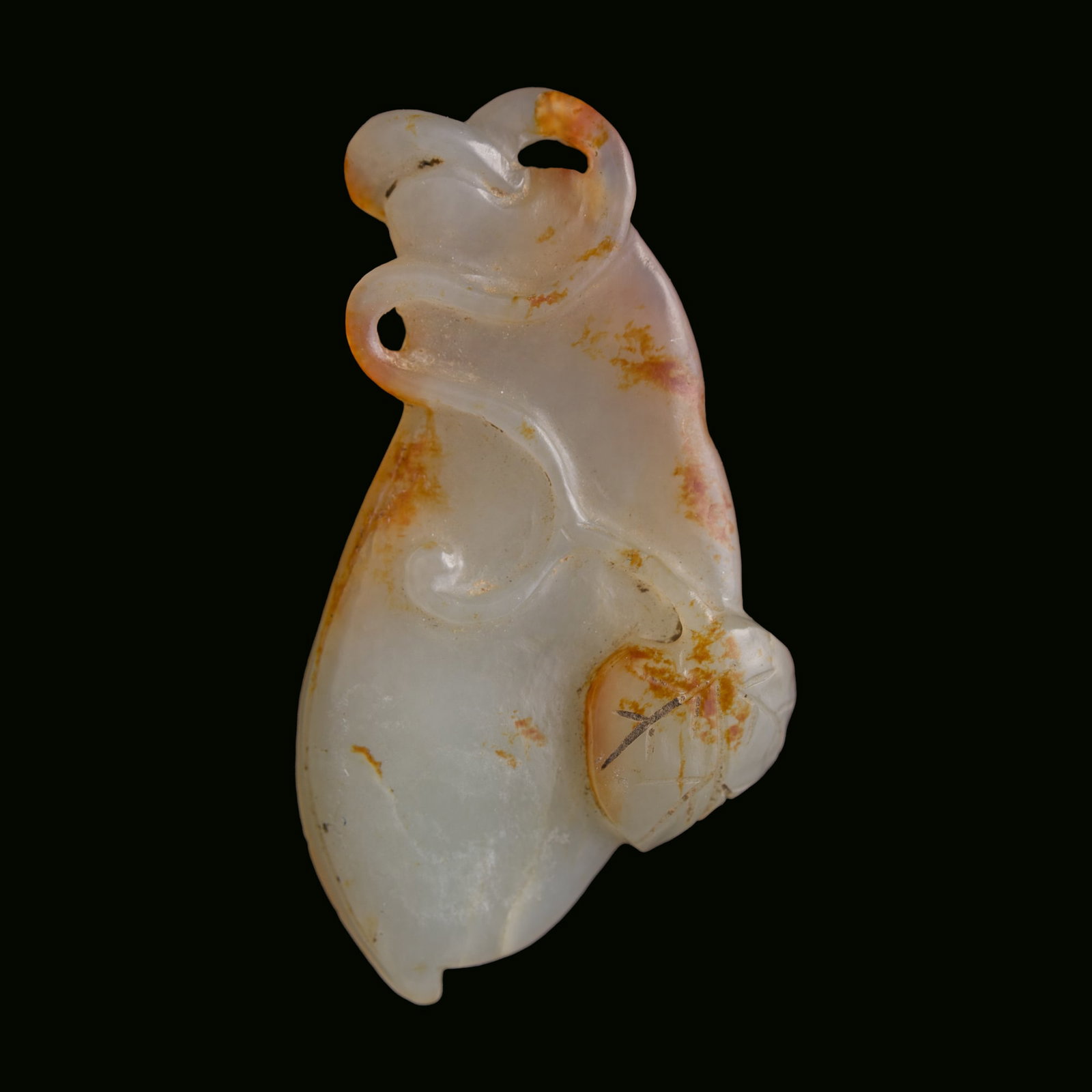A Chinese white jade bean pod-form pendant with russet skin, 18th century: A Chinese white jade bean pod-form pendant with russet skin 18th century H: 2, W: 1 1/8 in. (H: 5.1, W: 2.9 cm.) From Mr. Shapiro in Edison, New Jersey.