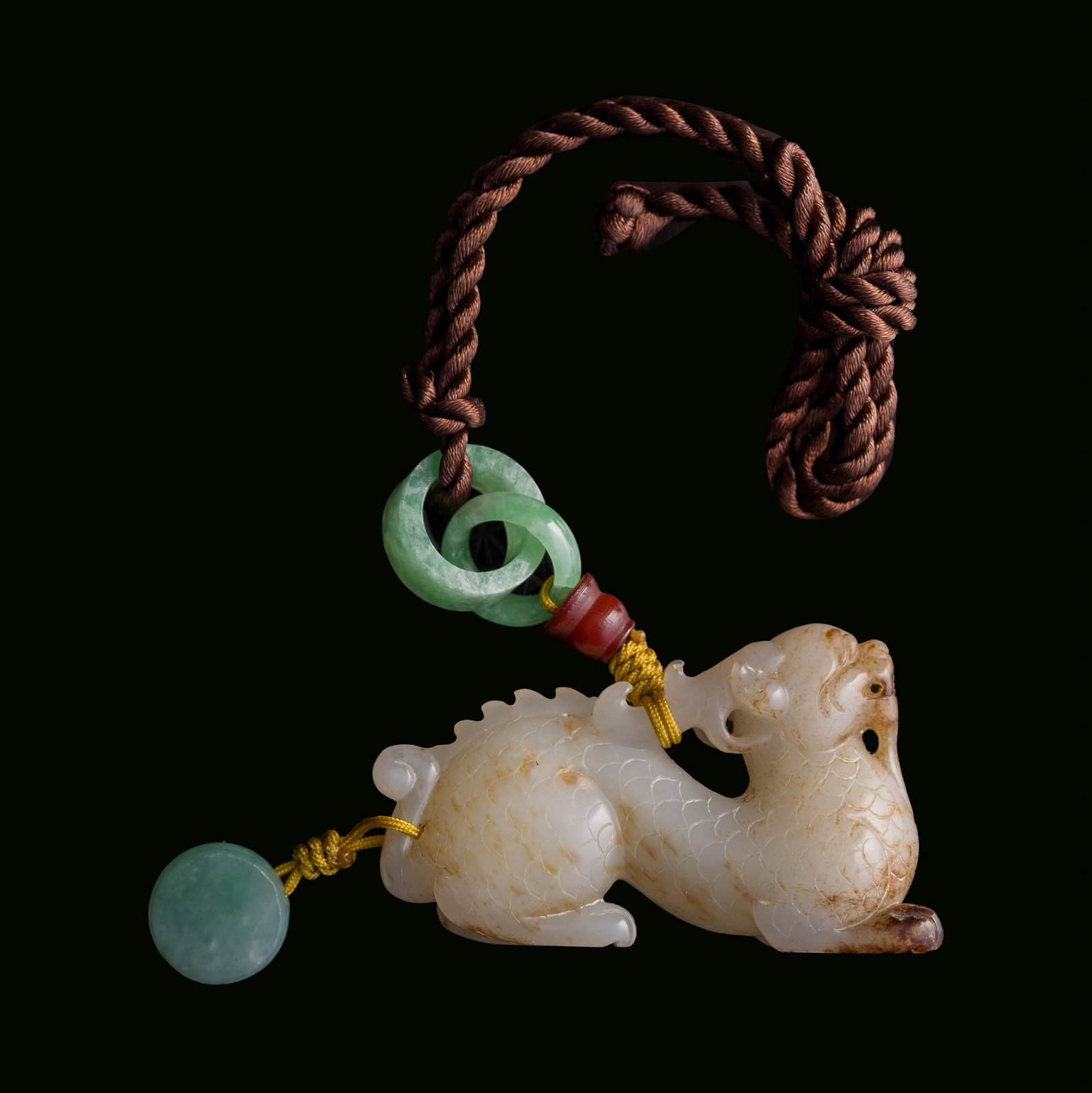 A Chinese jade carving of a mythical beast, Ming dynasty or earlier (1 of 8)