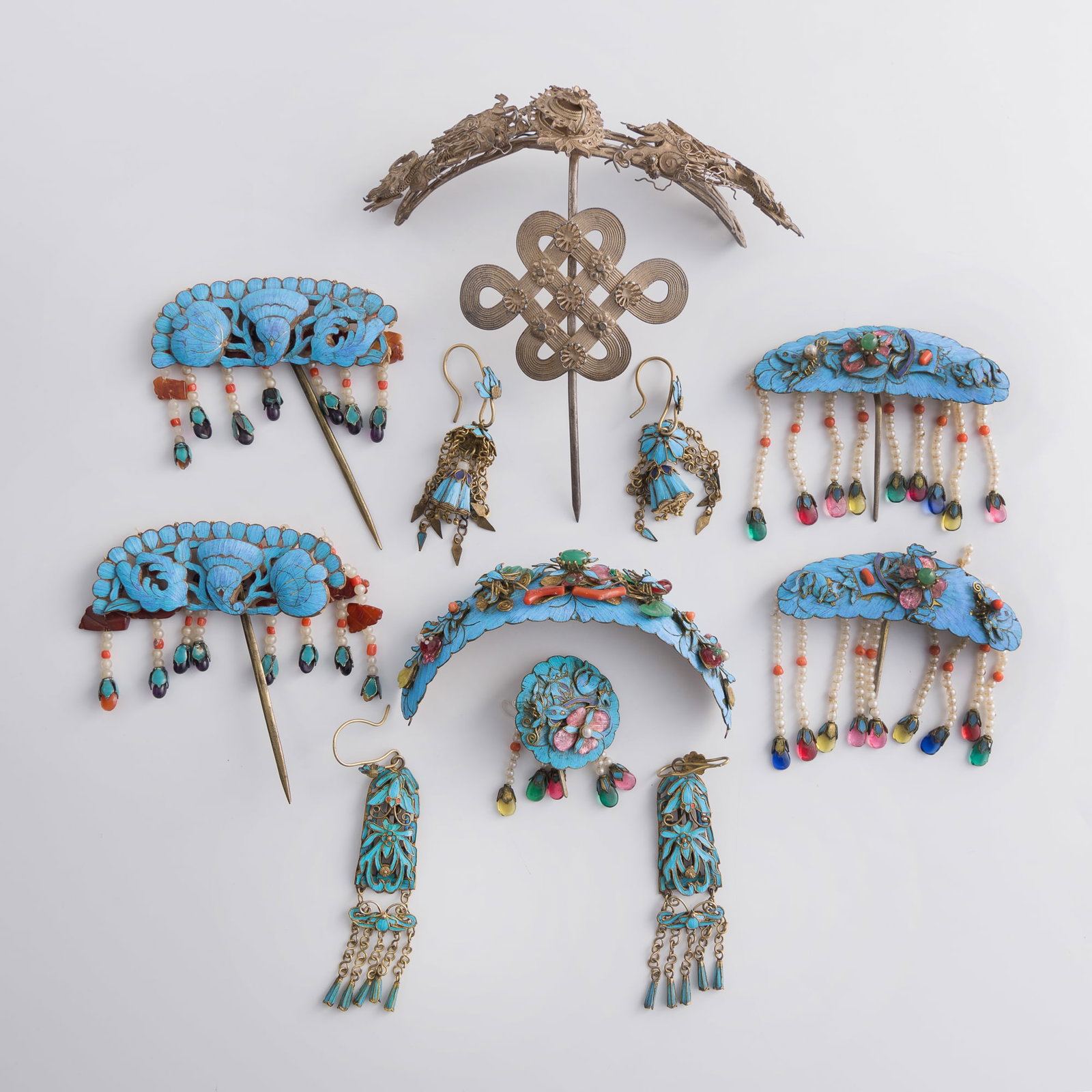 Eleven Chinese kingfisher feather jewelry, Qing dynasty: Eleven Chinese kingfisher feather jewelry Qing dynasty H: 5, W: 5 1/8, D: 1 3/4 in. (H: 12.7, W: 13, D: 4.4 cm. (largest)) Weight: 182.7 g (overall) From Mrs. Morrison, Silver Spring, Maryland.