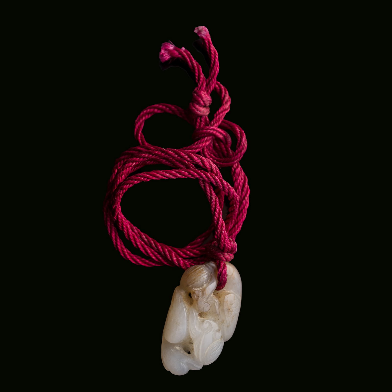 A Chinese carved white jade 'spring water' pendant, Ming dynasty or earlier (1 of 7)