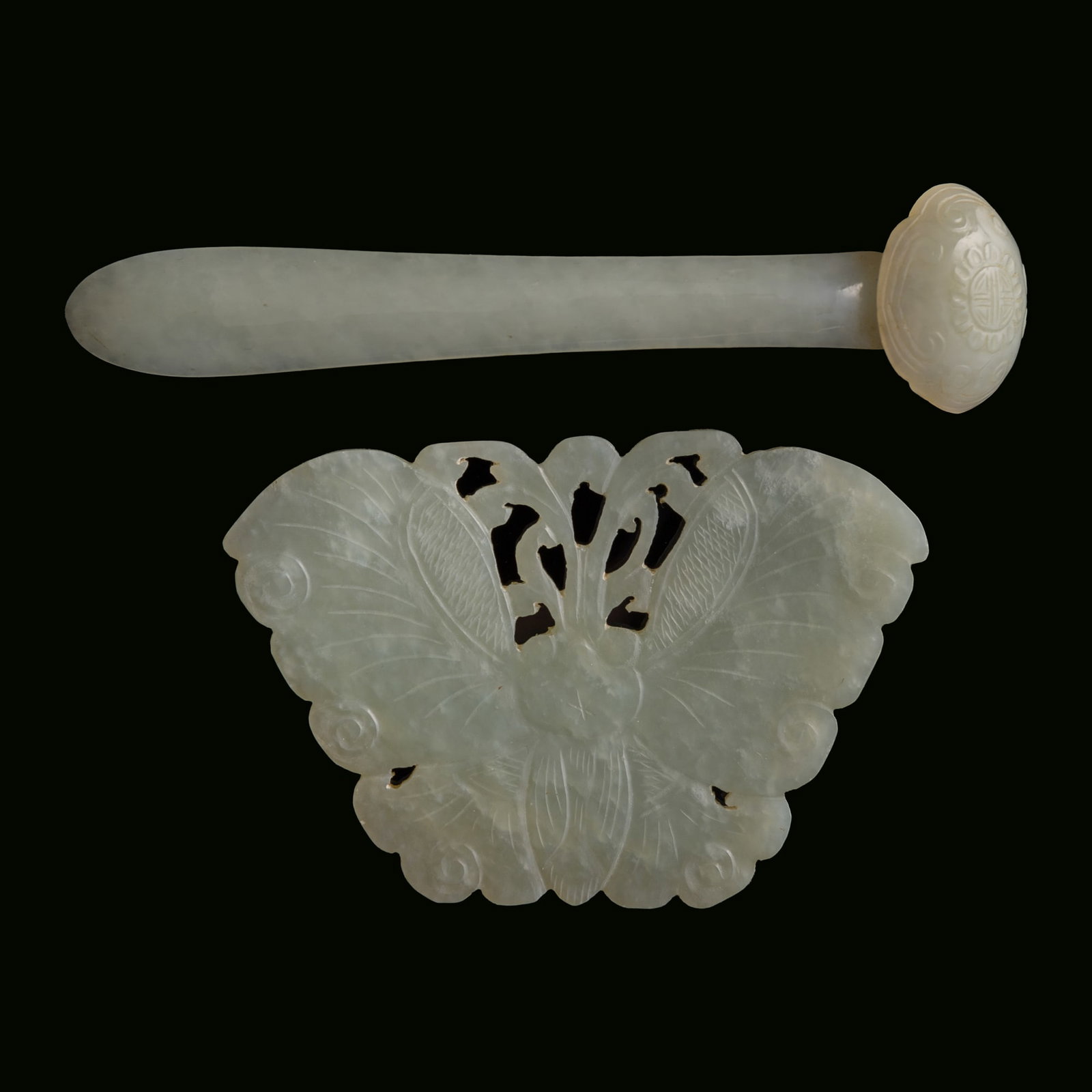 A Chinese white jade butterfly-form pendant and a ruyi-form hairpin, 19th century: A Chinese white jade butterfly-form pendant and a ruyi-form hairpin 19th century H: 2 1/4, W: 3 1/4, D: 1/8 in. (H: 5.7, W: 8.3, D: 0.3 cm. (butterfly)) From Mr. Kaufman in Arlington, Virginia; a fami