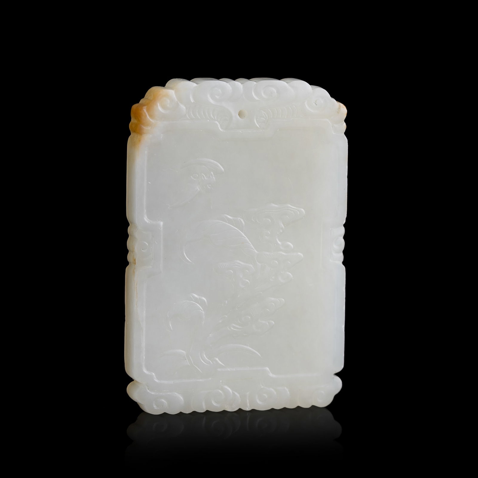 A Chinese white jade 'ji xiang' plaque, Qing dynasty: A Chinese white jade 'ji xiang' plaque Qing dynasty H: 2 3/8, W: 1 5/8, D: 1/4 in. (H: 6, W: 4.1, D: 0.6 cm.) Private collection, Southern California.