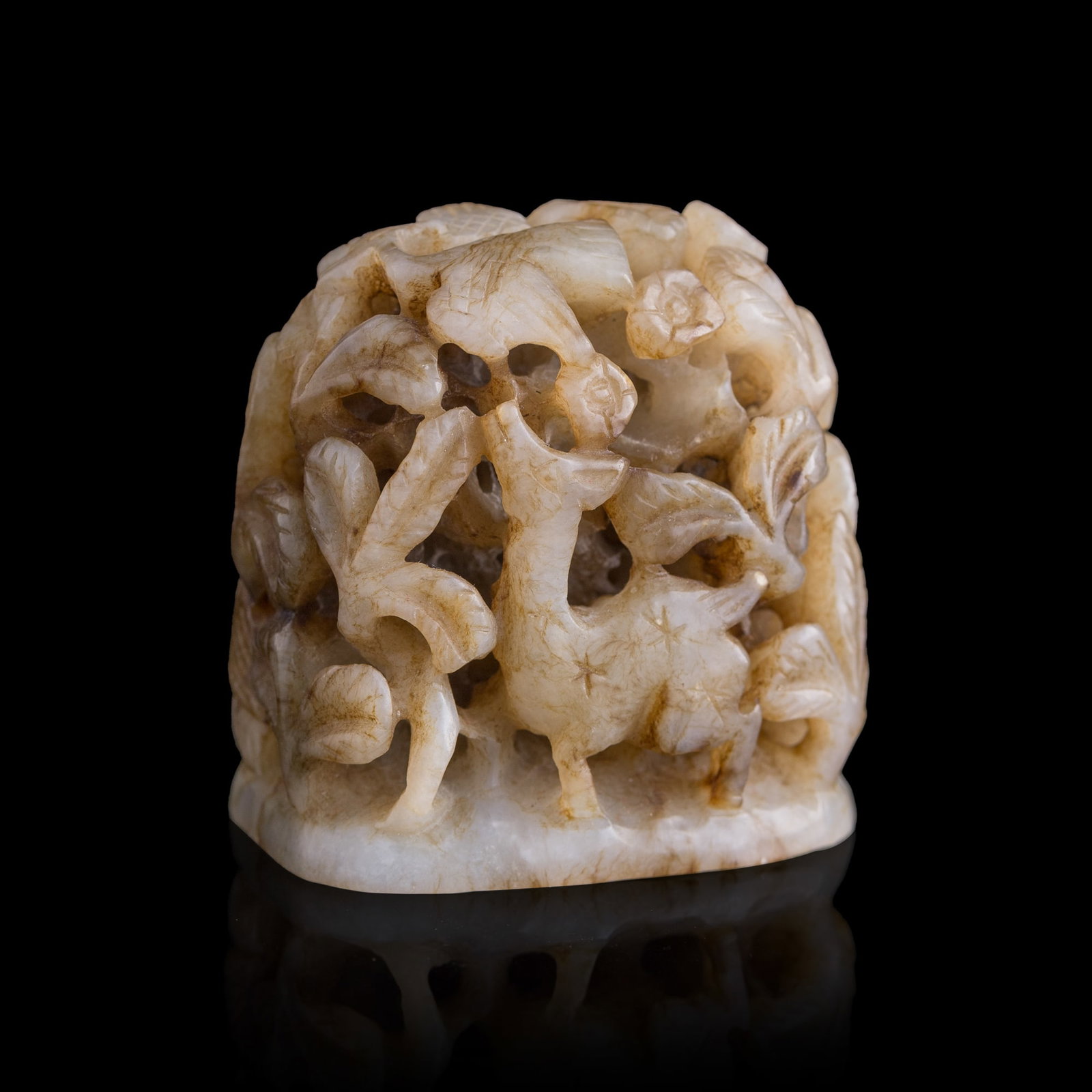 A Chinese reticulated jade incense burner finial, Ming dynasty: A Chinese reticulated jade incense burner finial Ming dynasty H: 2 1/8, W: 2 1/8, D: 1 1/2 in. (H: 5.4, W: 5.4, D: 3.8 cm.) Private collection, Southern California.