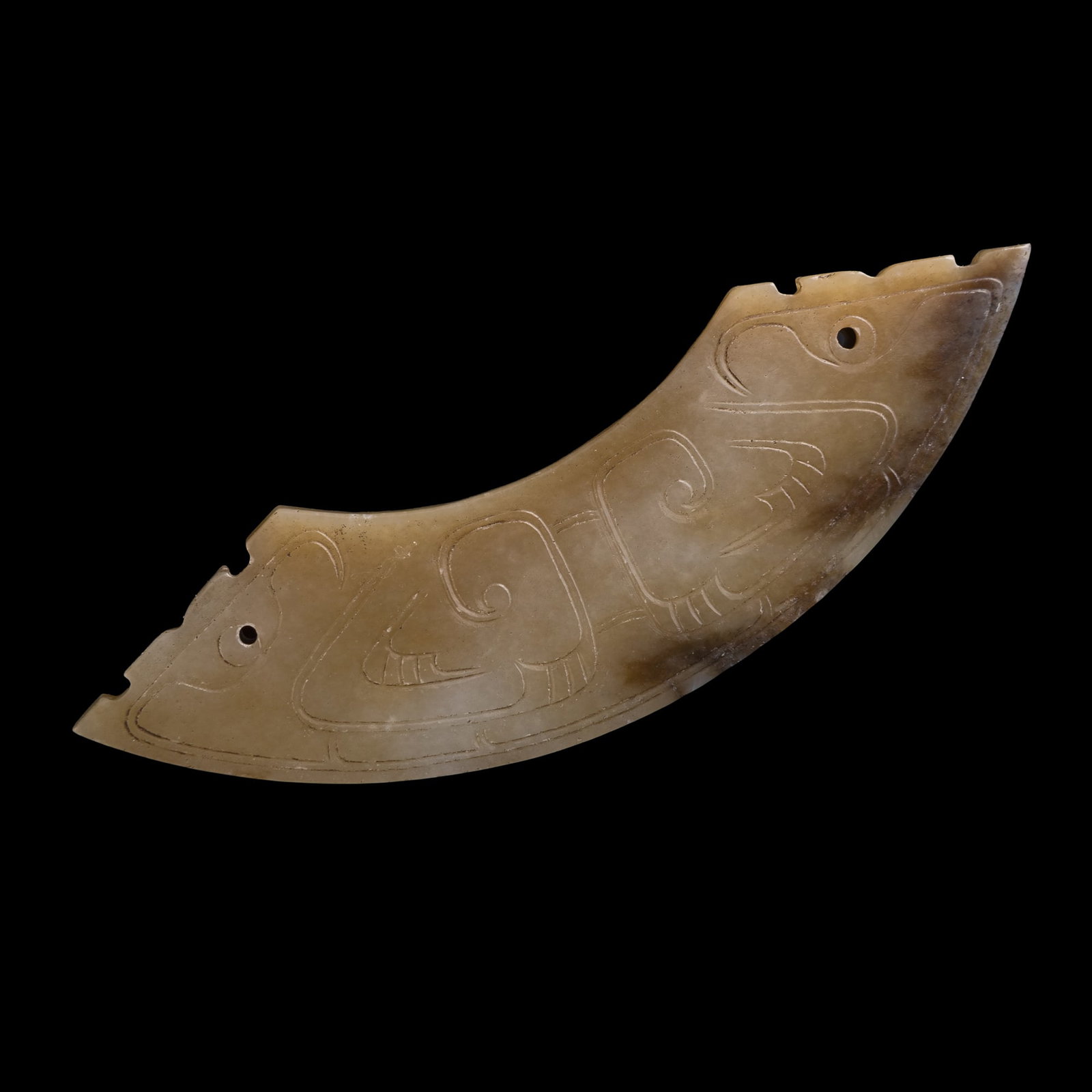 A Chinese jade huang, Ming dynasty or earlier: A Chinese jade huang Ming dynasty or earlier L: 5 3/4, W: 1 1/2, D: 3/16 in. (L: 14.6, W: 3.8, D: 0.5 cm.) Private collection, Honolulu, Hawaii. Click