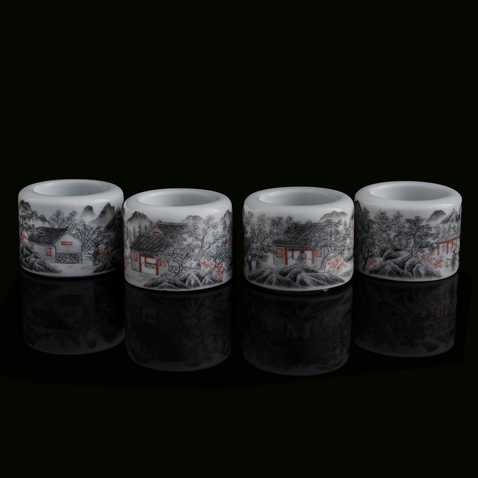 Four Chinese famille rose 'landscape' archer’s rings, modern: Four Chinese famille rose 'landscape' archer’s rings modern Each with six-character mark to the exterior. (4). Inner Dia.: 23.4 mm, H: 25.8 mm (each) From Mrs. Kiang in Newport Coast, California; co