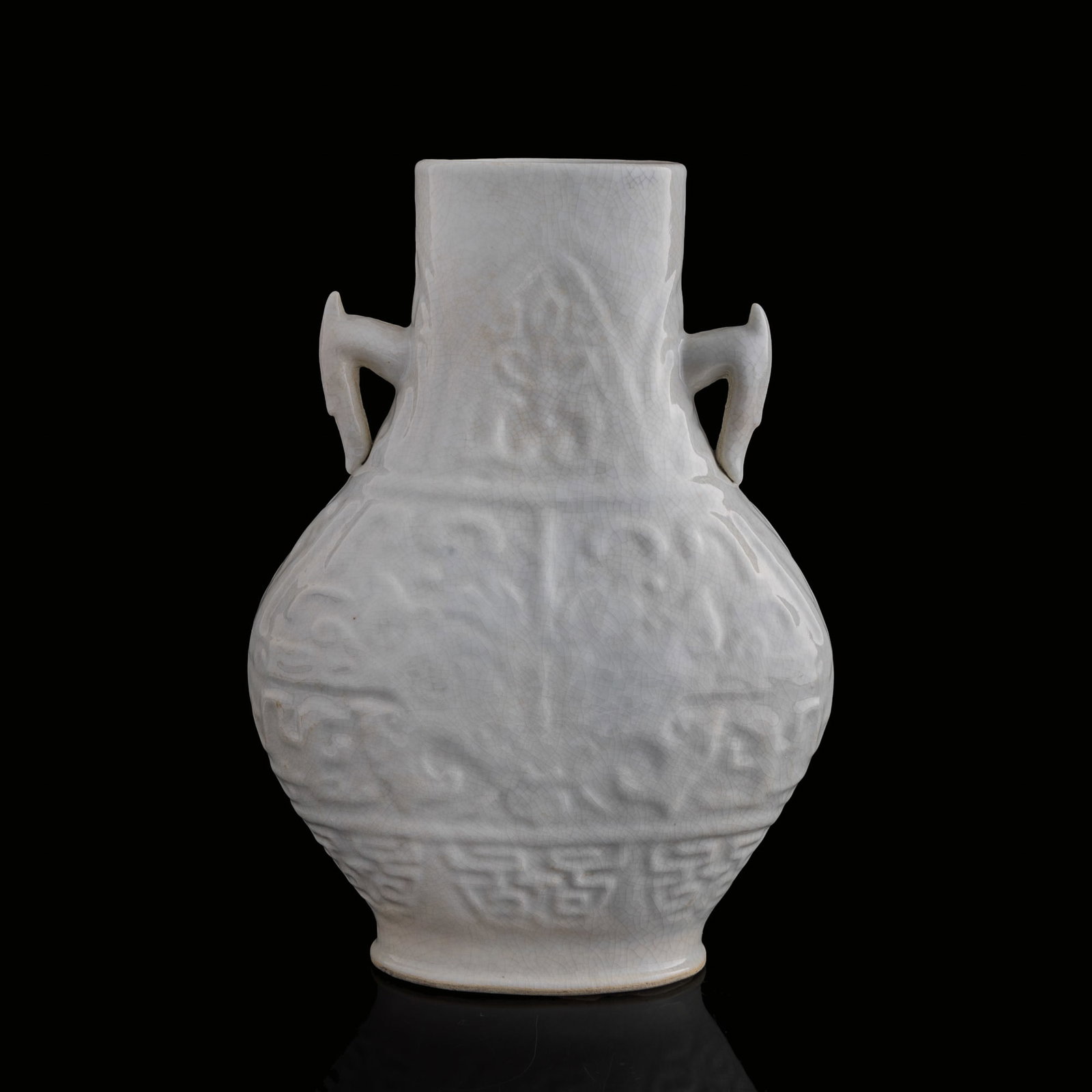 A Chinese Ding-type double-handled vase, Qing dynasty (1 of 8)