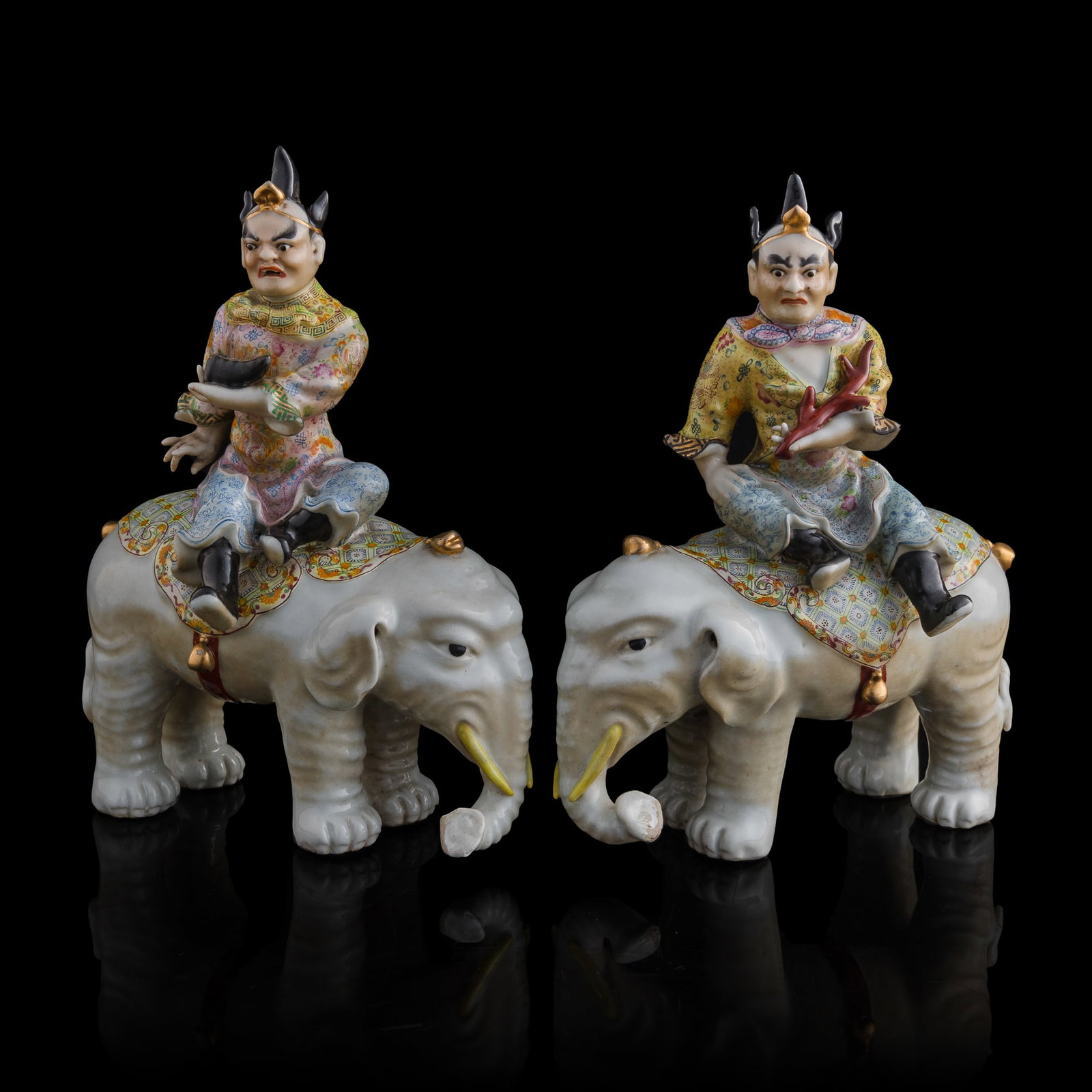 A pair of Chinese famille rose figures of luohans riding elephants, Republic period: A pair of Chinese famille rose figures of luohans riding elephants Republic period H: 10 1/2, W: 8, D: 4 3/4 in. (H: 26.7, W: 20.3, D: 12.1 cm. (each)) From Mr. Chen, Great Neck, New York; acquired pr