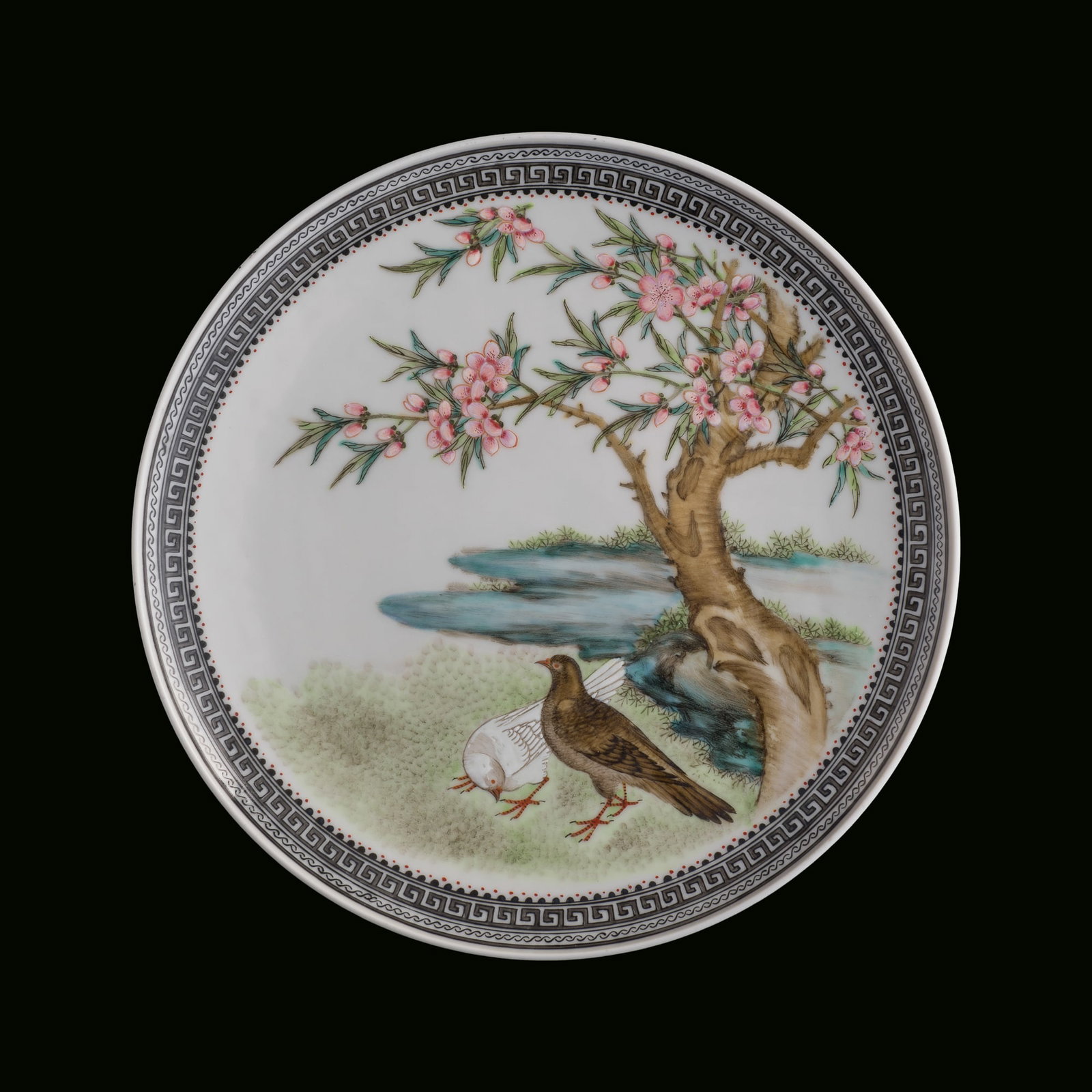 A Chinese famille rose 'dove' hanging plate, 1950s-1960s: A Chinese famille rose 'dove' hanging plate 1950s-1960s With a mark to underside. H: 1 1/4, Dia: 8 3/8 in. (H: 3.2, Dia: 21.3 cm.) Private collection, New York City, New York.