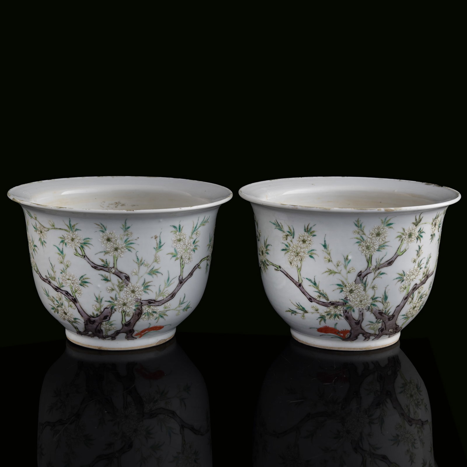 A pair of Chinese famille rose 'floral' jardinieres, late 19th century: A pair of Chinese famille rose 'floral' jardinieres late 19th century H: 6 1/8, Dia: 9 1/2 in. (H: 15.6, Dia: 24.1 cm. (each)) Private collection, Atlanta, Georgia.