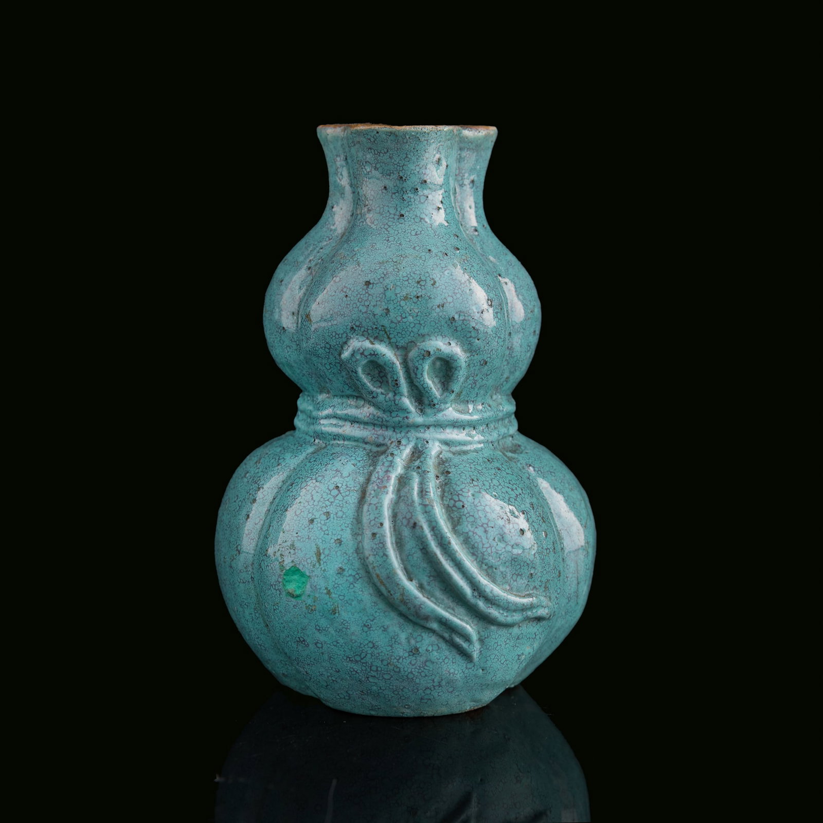A Chinese robin's-egg-glazed gourd-form vase, 19th century: A Chinese robin's-egg-glazed gourd-form vase 19th century H: 3 7/8, Dia: 2 1/2 in. (H: 9.8, Dia: 6.4 cm.) Private collection, Pennsylvania. Click here