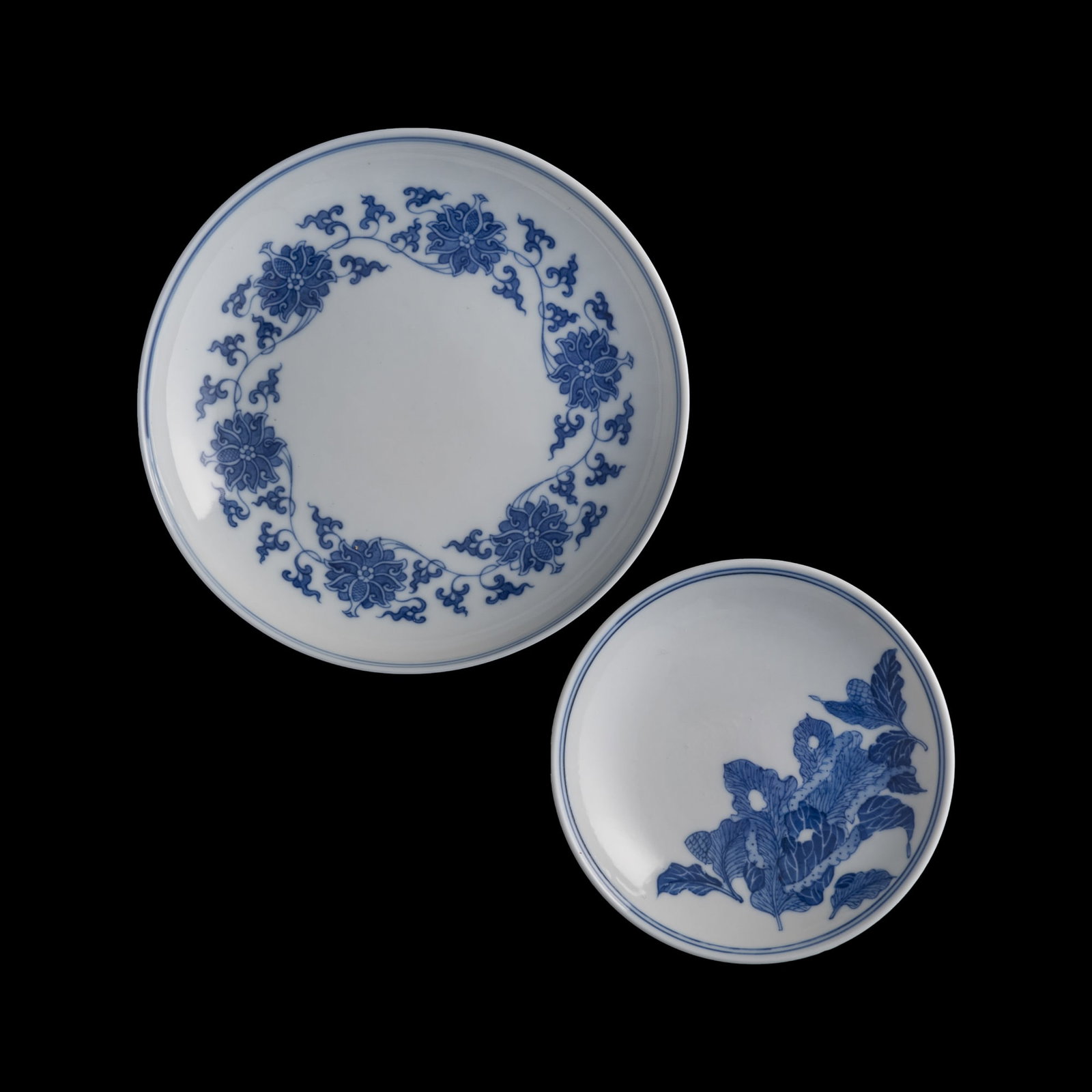 Two Chinese blue and white plates, Republic period: Two Chinese blue and white plates Republic period Each with "Jiangxi Ciye Gongsi" mark to underside. (2). H: 1, Dia: 5 5/8 in. (H: 2.5, Dia: 14.3 cm. (largest)) Private collection, Flushing, New York.