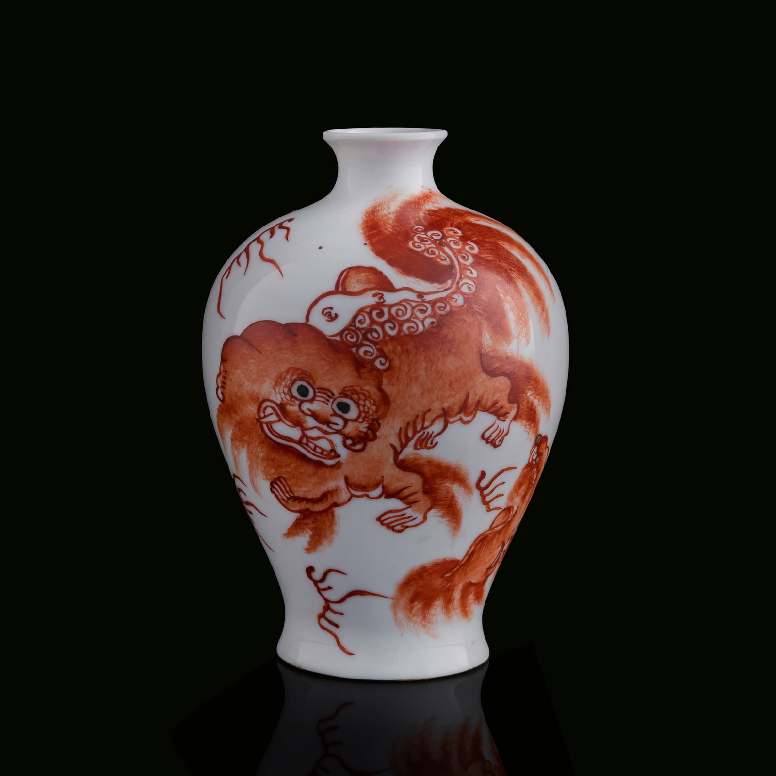 A Chinese iron-red 'lion' meiping vase, late 19th century: A Chinese iron-red 'lion' meiping vase late 19th century H: 5 7/8, Dia: 4 1/8 in. (H: 14.9, Dia: 10.5 cm.) Private collection, Fremont, California. Cli