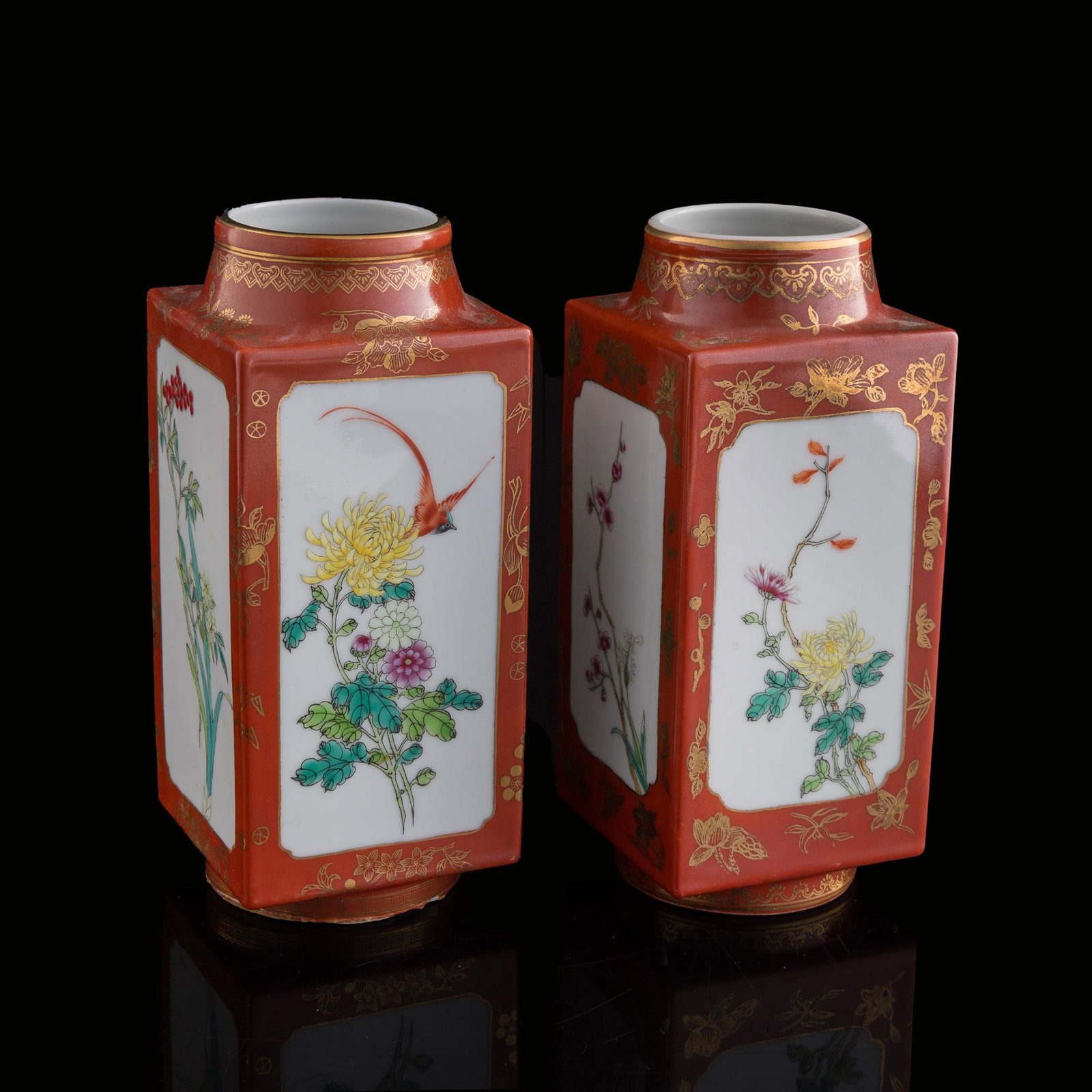 A pair of Chinese iron-red and famille rose 'flower and bird' cong-form vases, 1950s-1960s (1 of 9)