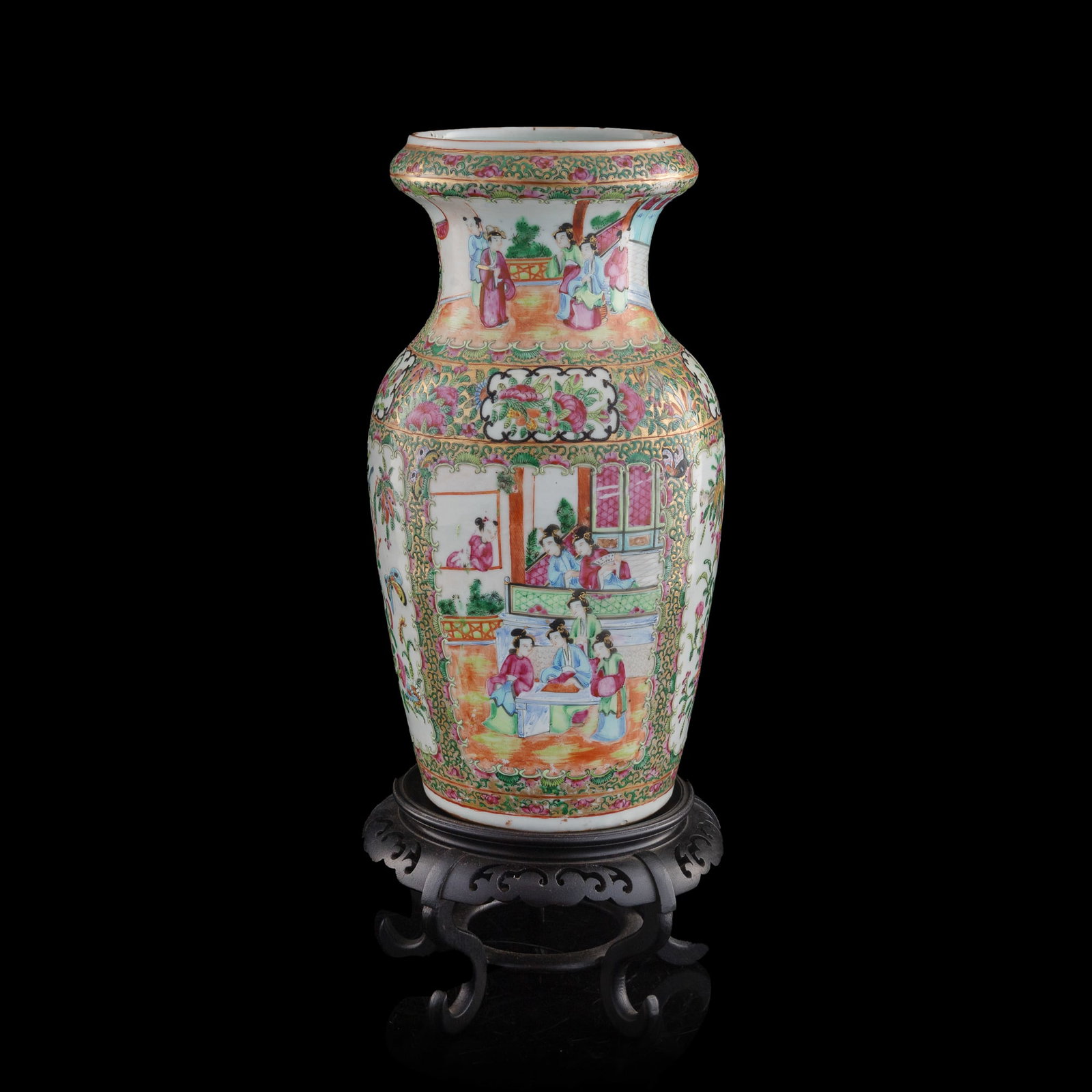 A Chinese rose medallion 'figural' vase with everted mouth, 19th century: A Chinese rose medallion 'figural' vase with everted mouth 19th century Sold with associated wooden stand. H: 14 1/8, Dia: 7 5/8 in. (H: 35.9, Dia: 19.4 cm. (vase)) Private collection, Southern Califo