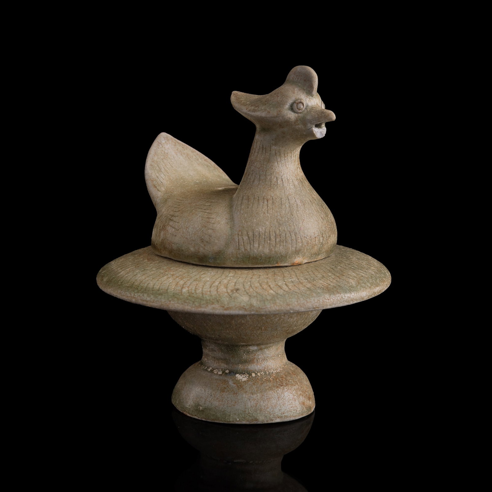 A Chinese celadon mandarin-duck-form incense burner, Song dynasty: A Chinese celadon mandarin-duck-form incense burner Song dynasty H: 4 7/8, Dia: 4 1/8 in. (H: 12.4, Dia: 10.5 cm.) Private collection, New Jersey. Clic