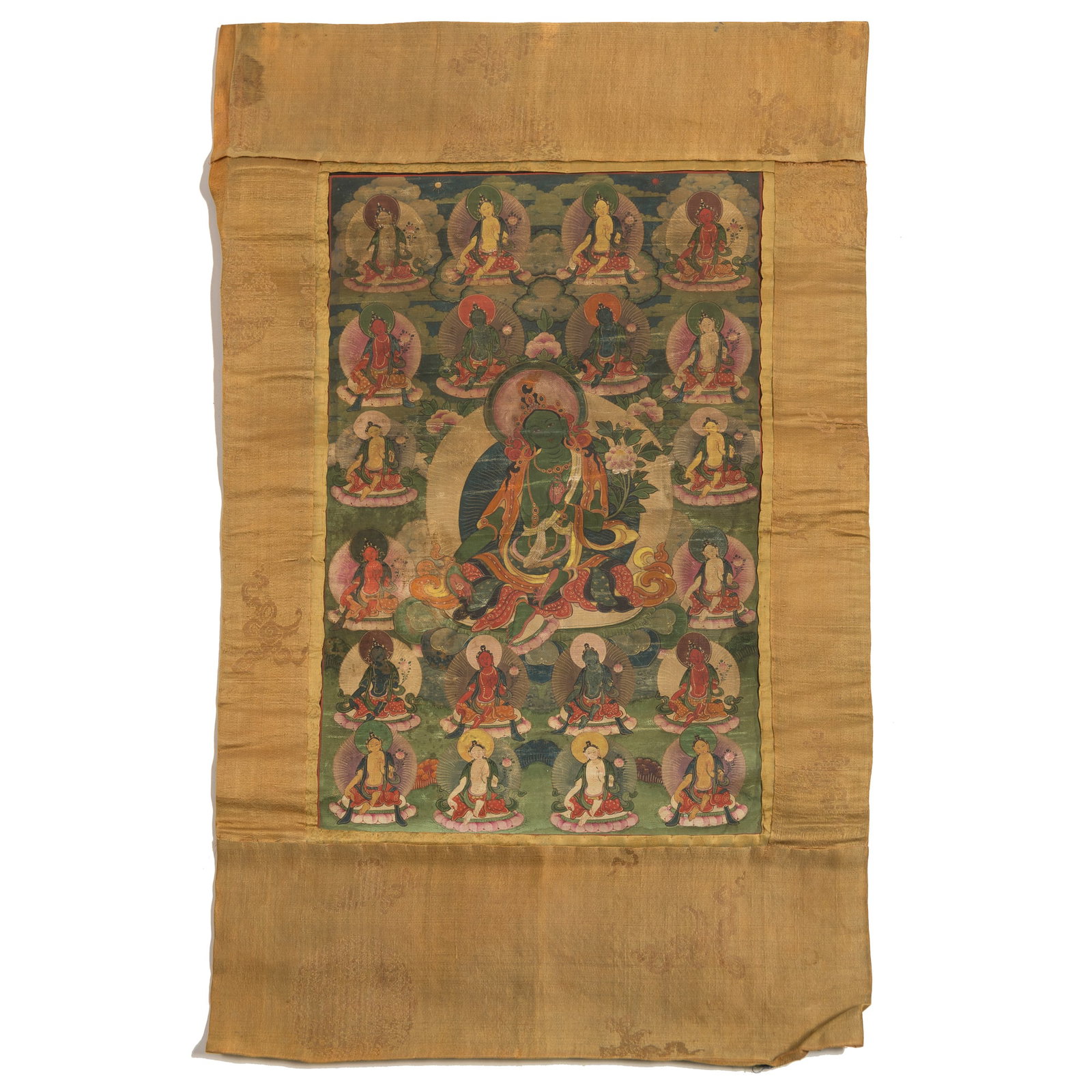 A thangka of the Twenty-One Taras, Qing dynasty: A thangka of the Twenty-One Taras Qing dynasty Sight dimensions: H: 20 1/2, W: 13 5/8 in. (H: 52.1, W: 34.6 cm.) From Mrs. Curren in Ventura, California, acquired by her grandmother.
