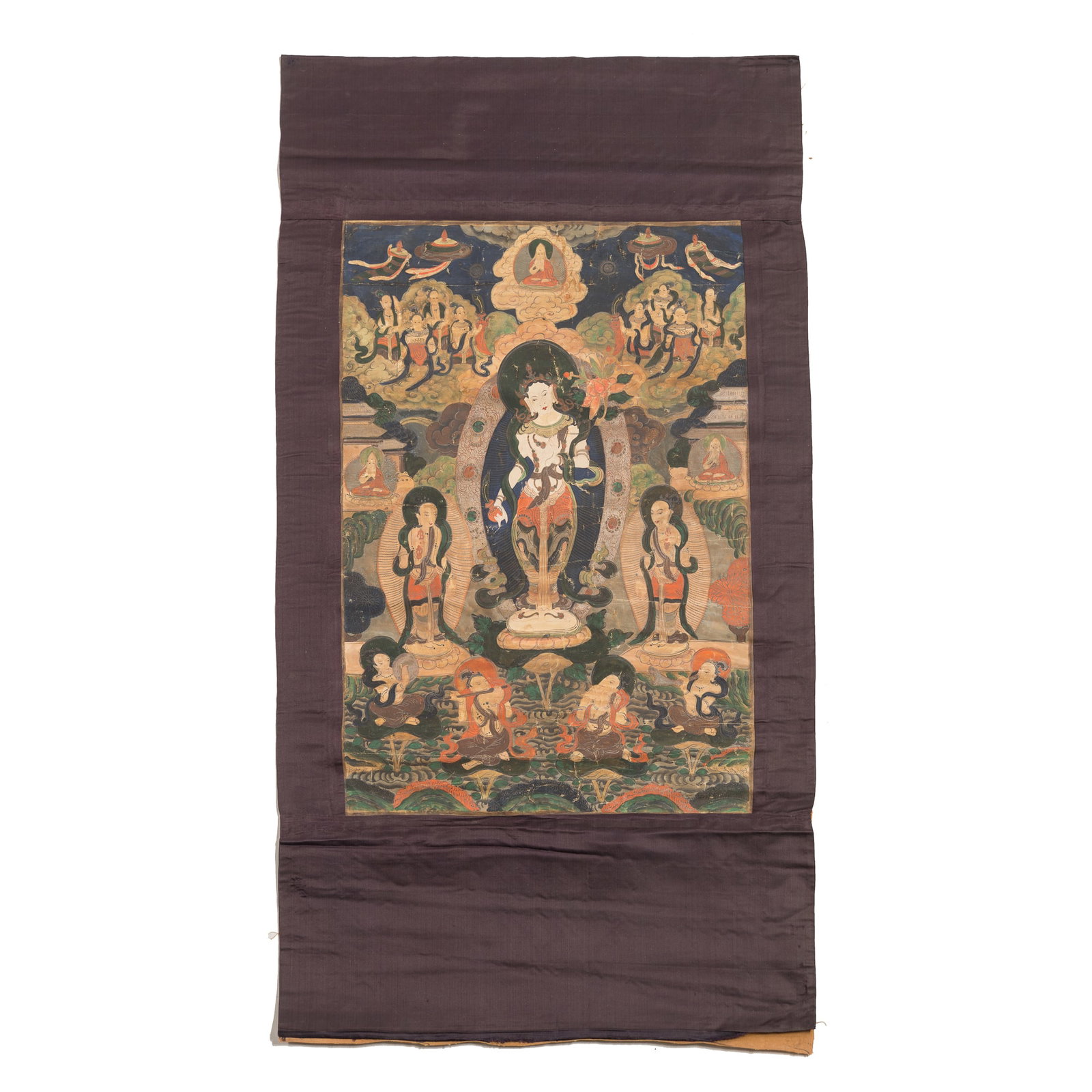 A thangka of White Tara, Qing dynasty: A thangka of White Tara Qing dynasty Sight dimensions: H: 24 5/8, W: 16 7/8 in. (H: 62.5, W: 42.9 cm.) From Mrs. Curren in Ventura, California, acquired by her grandmother.