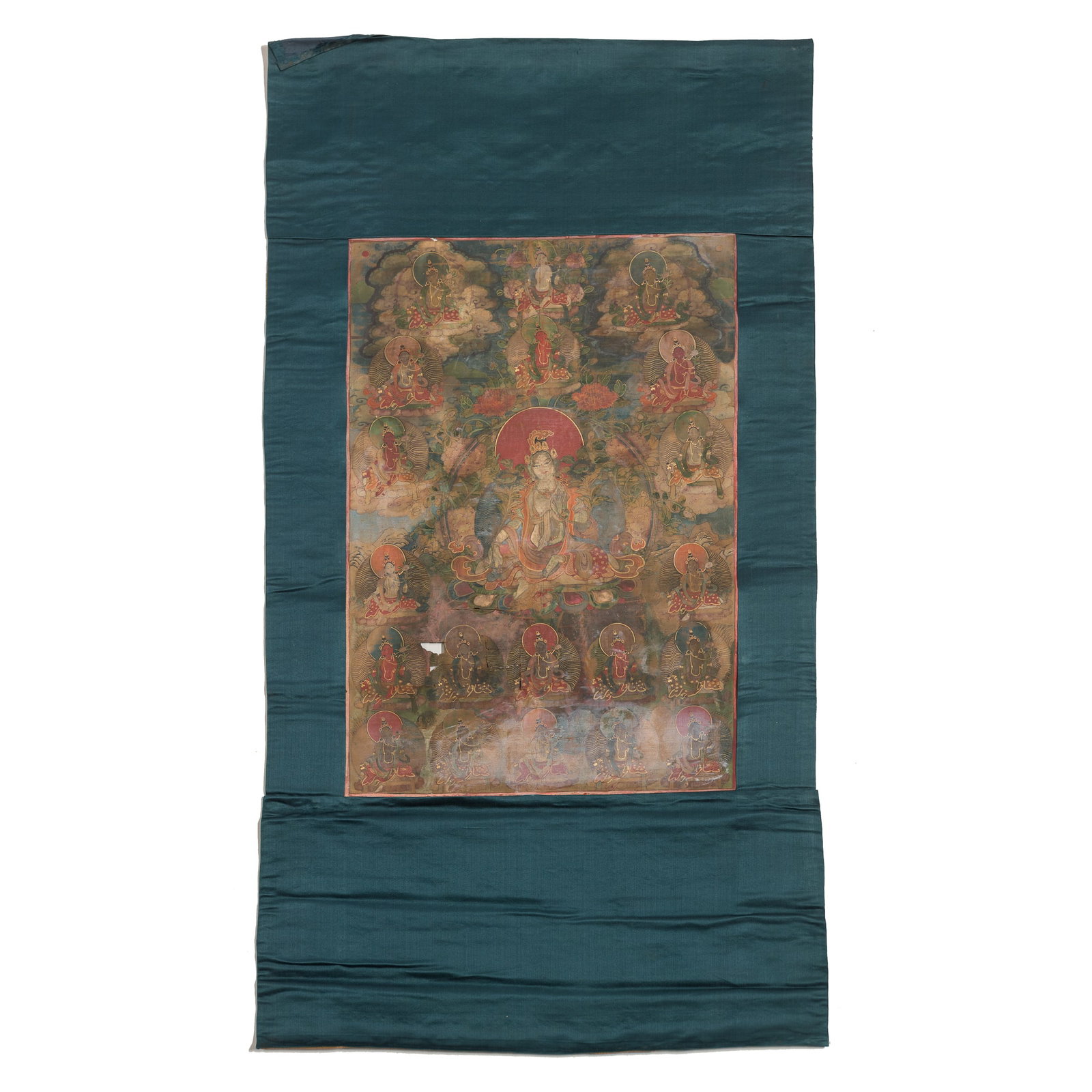 A thangka of the Twenty-One Taras, Qing dynasty: A thangka of the Twenty-One Taras Qing dynasty Sight dimensions: H: 19 1/2, W: 13 3/8 in. (H: 49.5, W: 34 cm.) From Mrs. Curren in Ventura, California, acquired by her grandmother.