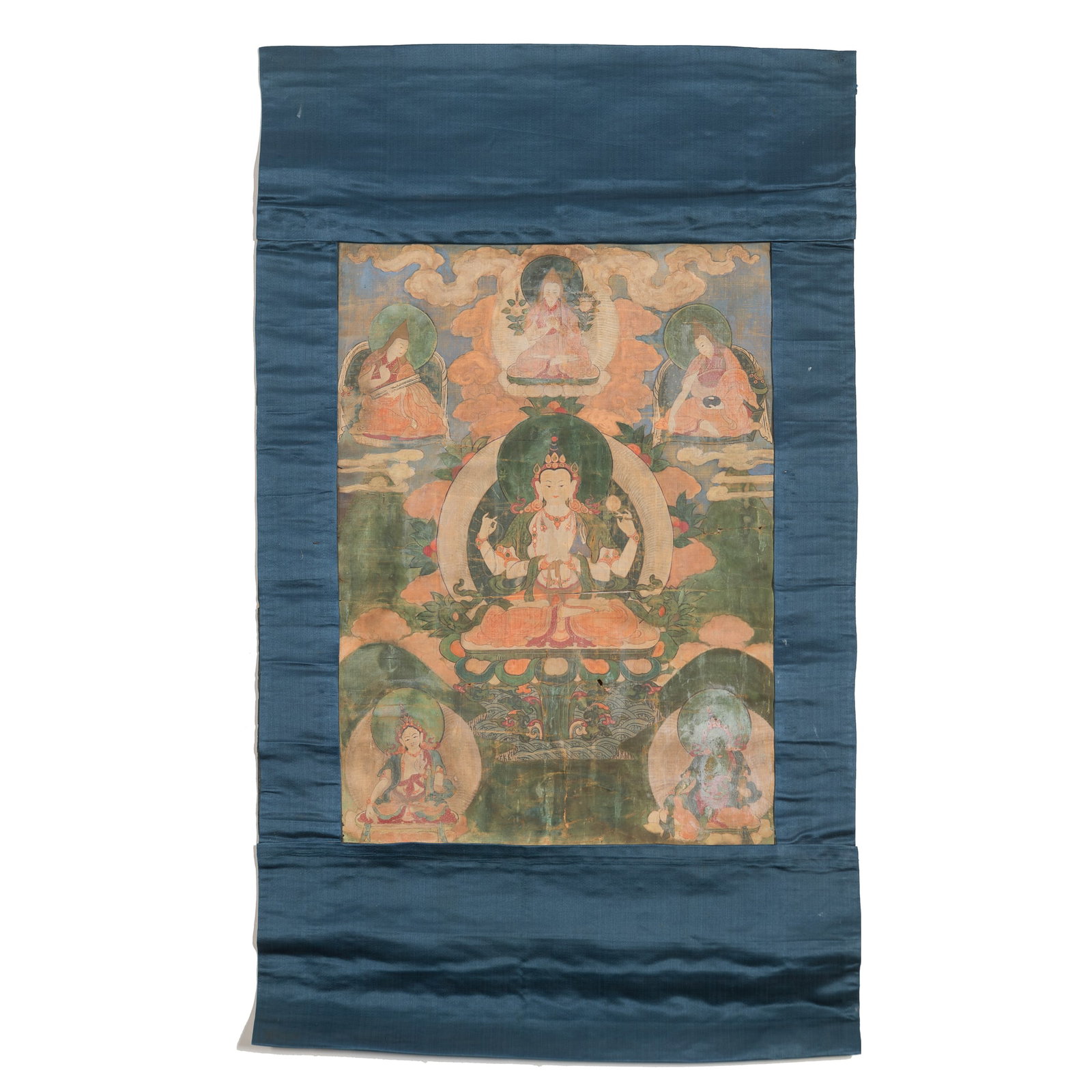 A thangka of Four-Armed Avalokiteshvara, Qing dynasty: A thangka of Four-Armed Avalokiteshvara Qing dynasty Sight dimensions: H: 17 5/8, W: 12 5/8 in. (H: 44.8, W: 32.1 cm.) From Mrs. Curren in Ventura, California, acquired by her grandmother.