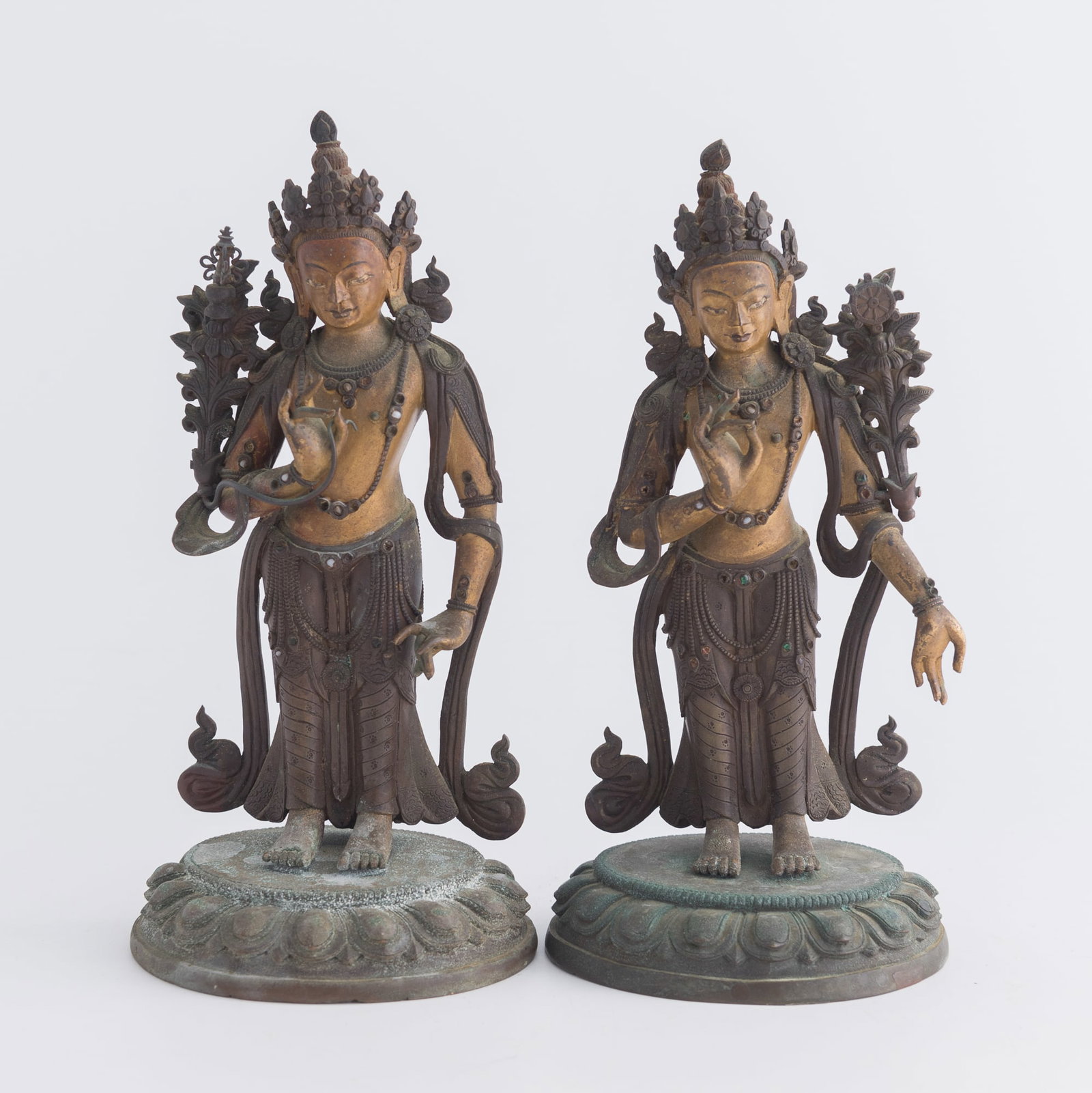 A pair of Himalayan gilt-lacquered bronze figures of Padmapani, 18th century: Weight: 1086 g (overall) Private estate, Carlsbad, California. Click here for high resolution images.