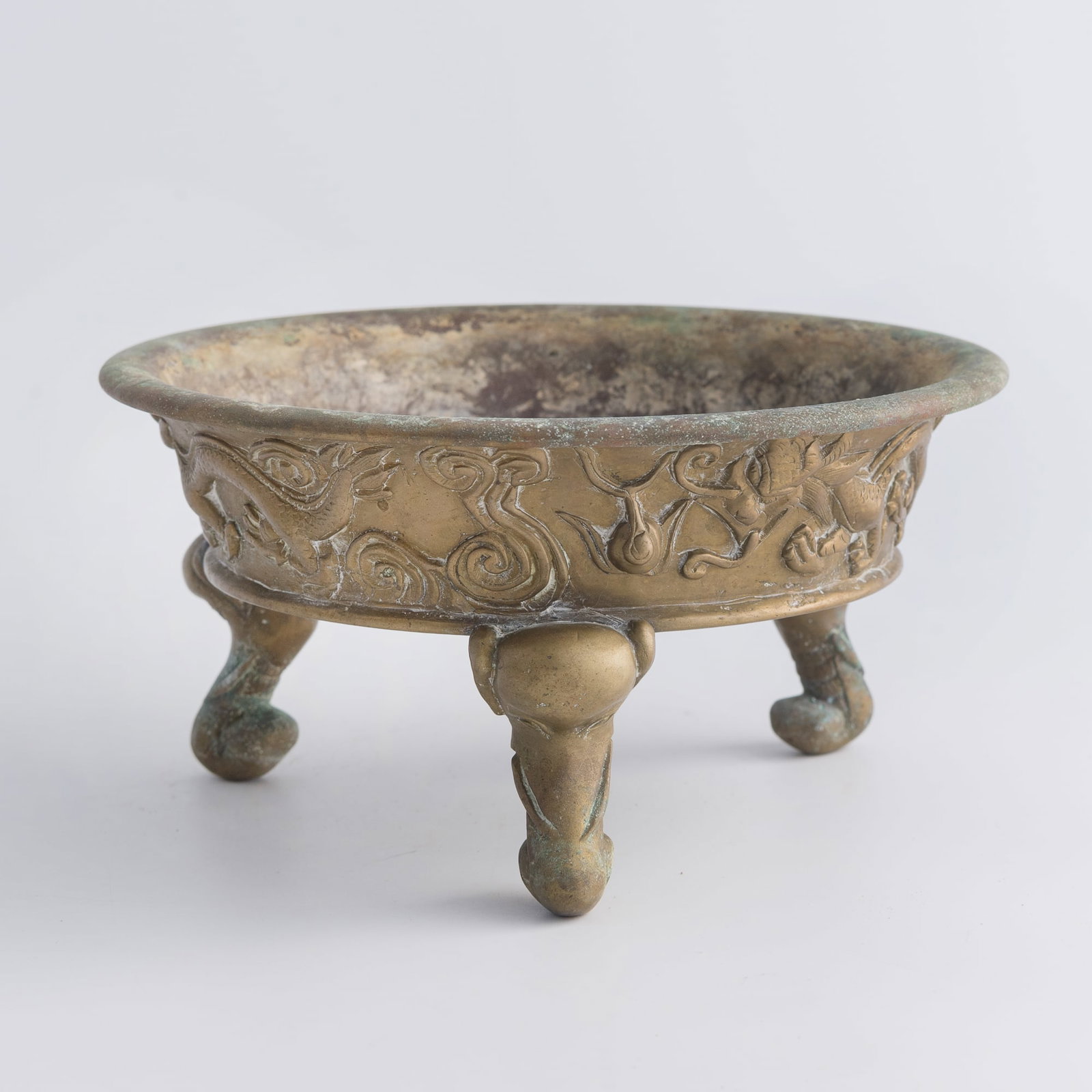 A Chinese bronze censer with elephant-head feet, 19th century: A Chinese bronze censer with elephant-head feet 19th century With four-character mark to underside. H: 4, Dia: 7 7/8 in. (H: 10.2, Dia: 20 cm.) Weight: 2100 g Private collection, Boston, Massachusetts