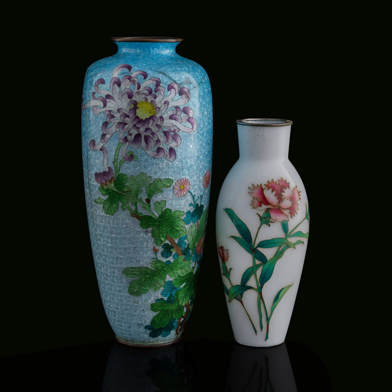Two Japanese cloisonne 'floral' vases, Meiji period: Two Japanese cloisonne 'floral' vases Meiji period Each with a mark to underside. (2). H: 9 3/4, Dia: 4 3/8 in. (H: 24.8, Dia: 11.1 cm. (largest)) From Mr. Wong in Rockville, Maryland; a family heirlo