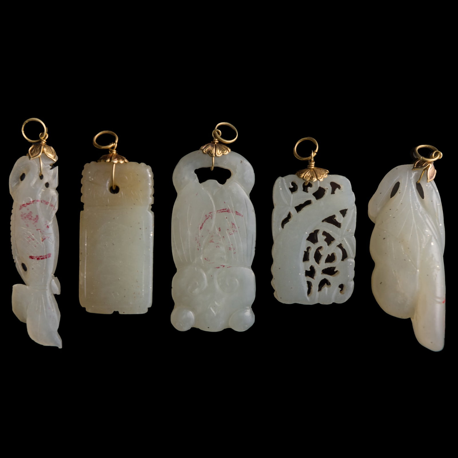 Five Chinese white jade pendants, Ming/Qing dynasty: Five Chinese white jade pendants Ming/Qing dynasty H: 1 3/4, W: 3/4, D: 1/2 in. (H: 4.4, W: 1.9, D: 1.3 cm. (largest)) Private collection, Arlington, Virginia.