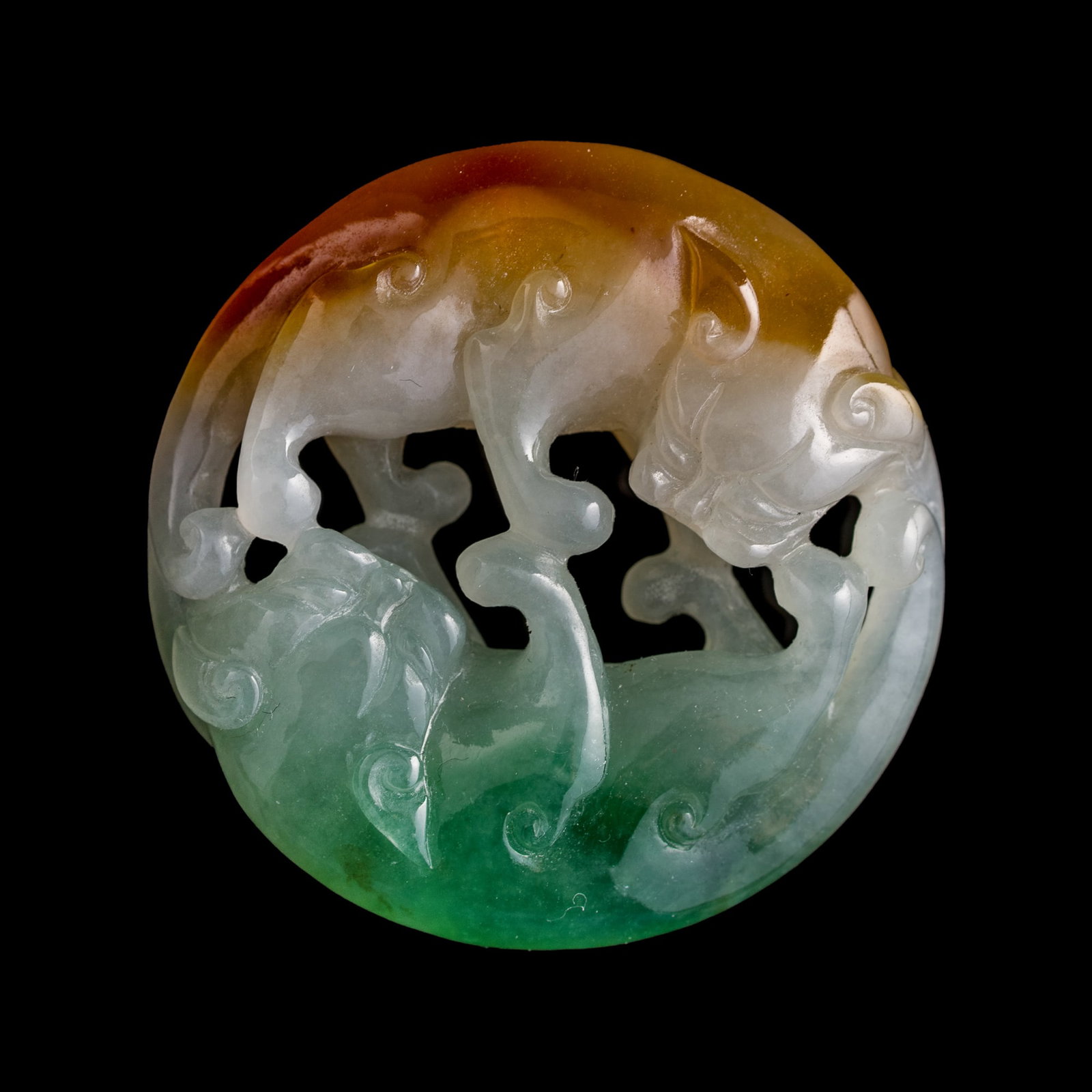 A Chinese jadeite pendant of double badgers, Qing dynasty (1 of 6)