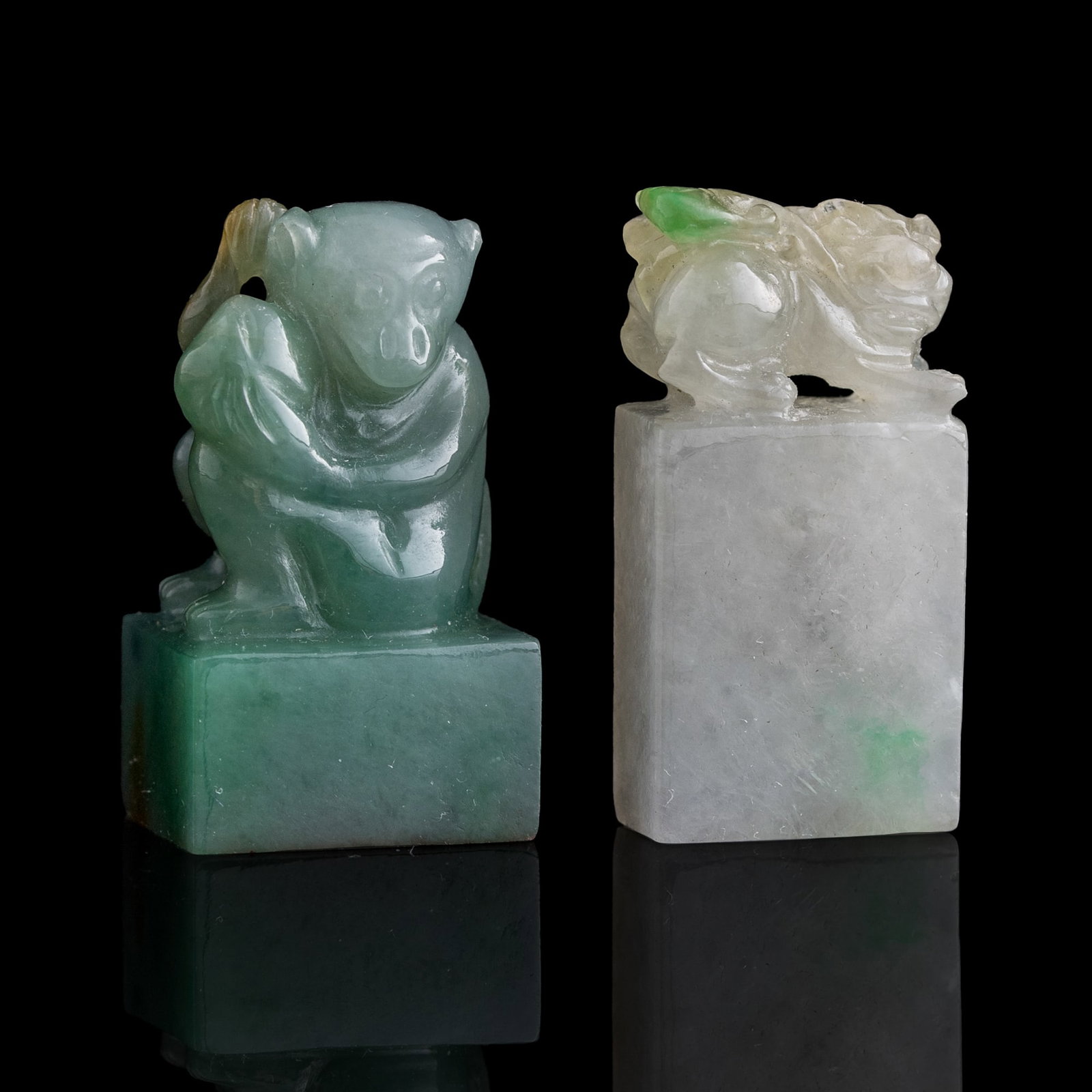 Two Chinese jadeite seals, Qing dynasty: Two Chinese jadeite seals Qing dynasty One with character marking to underside. (2). H: 1 1/4, W: 3/4, D: 5/8 in. (H: 3.2, W: 1.9, D: 1.6 cm. (monkey seal)) From Mrs. Kiang in Newport Coast, Californi