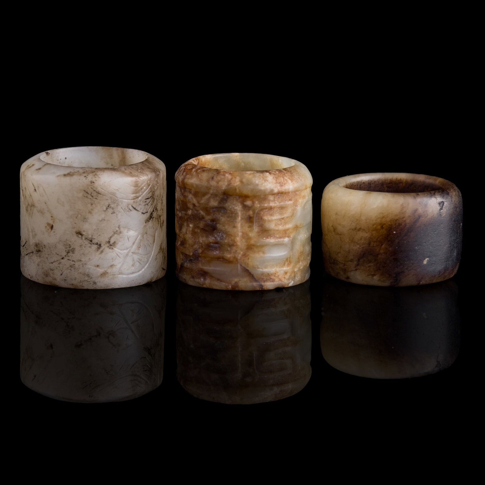 Three Chinese jade archer's rings, 18th/19th century (1 of 9)