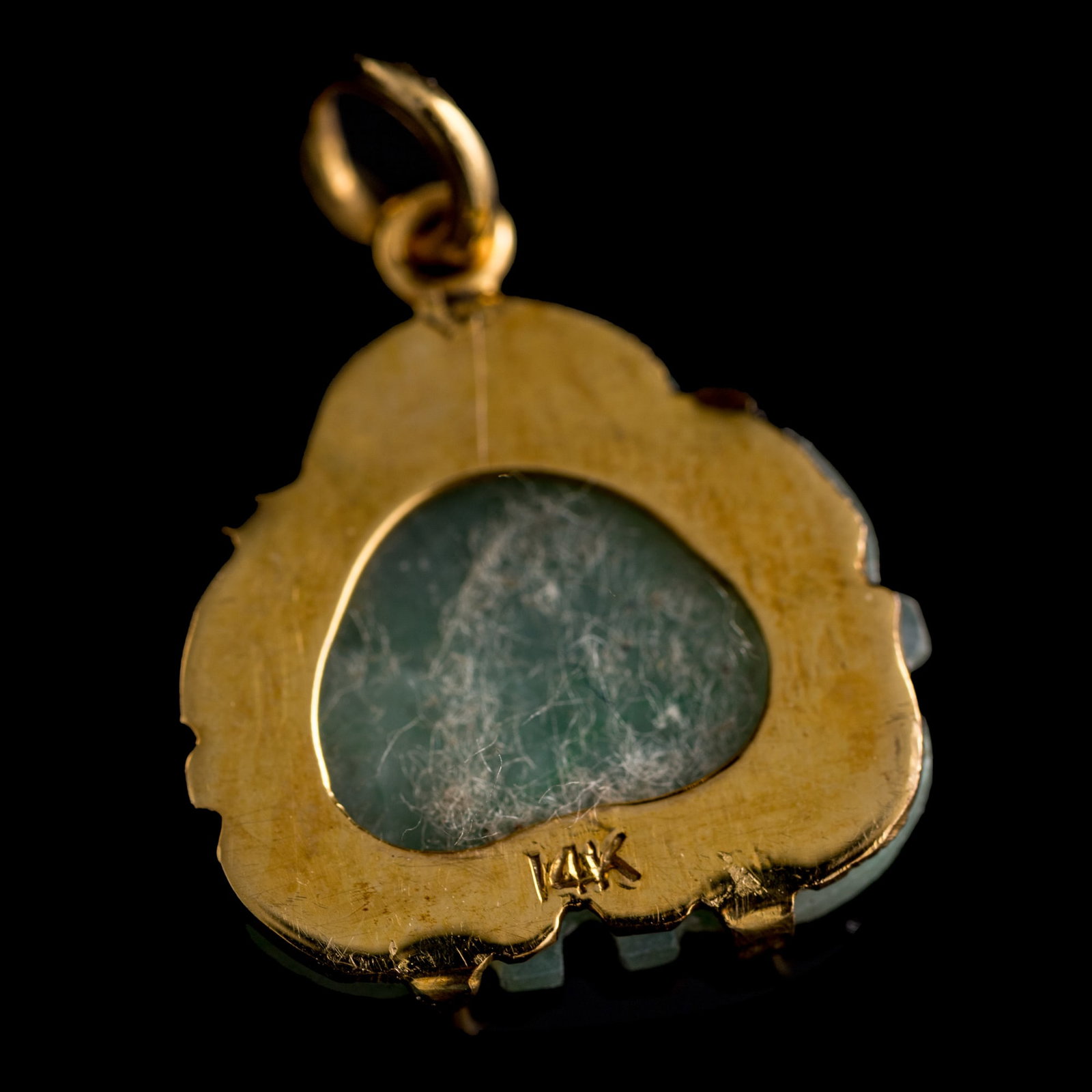 Seven assorted jadeite pendants - 10