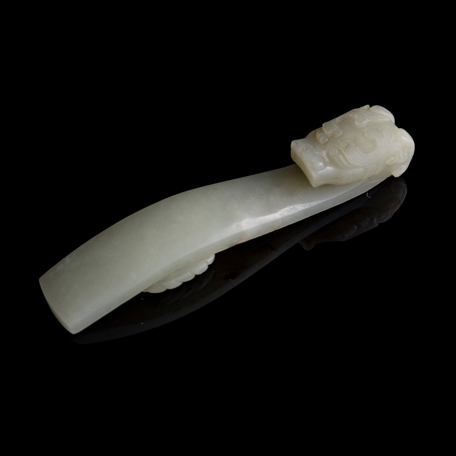 A Chinese white jade dragon hook, 18th century (1 of 7)