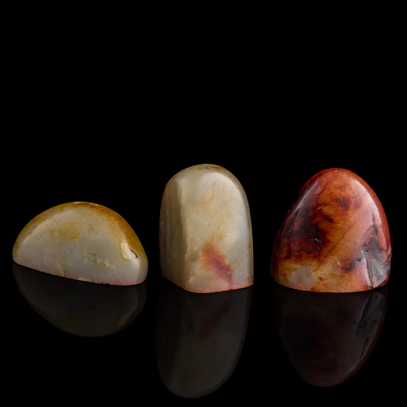 Three Chinese jade pebble seals, Ming/Qing dynasty: Three Chinese jade pebble seals Ming/Qing dynasty One with two-character mark, one with three-character mark, and one with four-character mark to underside. (3). H: 1 1/4, W: 1 3/4, D: 1 1/8 in. (H: 3