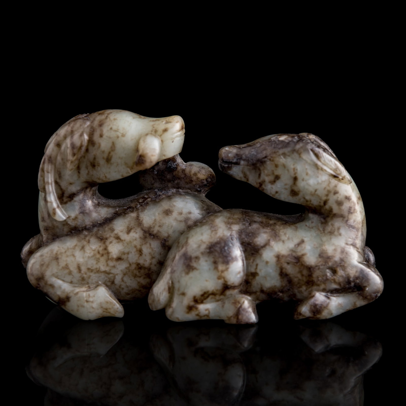 A Chinese jade carving of double deer, Ming dynasty: A Chinese jade carving of double deer Ming dynasty H: 2 1/2, W: 4 1/4, D: 1 1/2 in. (H: 6.4, W: 10.8, D: 3.8 cm.) Private collection, Charlottesville, Virginia.