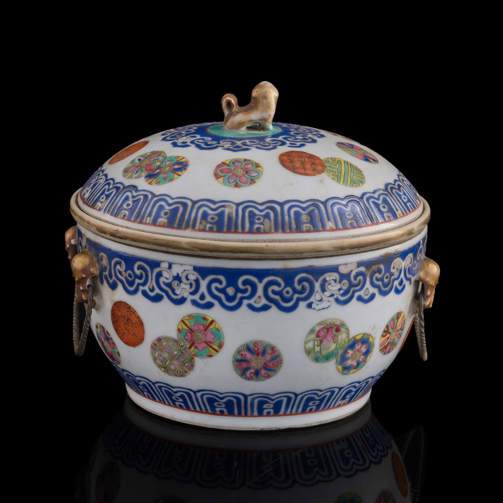 A Chinese famille rose 'floral medallion' warming pot, late 19th century: A Chinese famille rose 'floral medallion' warming pot late 19th century With six-character mark to underside. H: 5, W: 5 5/8, D: 5 1/2 in. (H: 12.7, W: 14.3, D: 14 cm.) From Mrs. Chang, San Diego, Cal