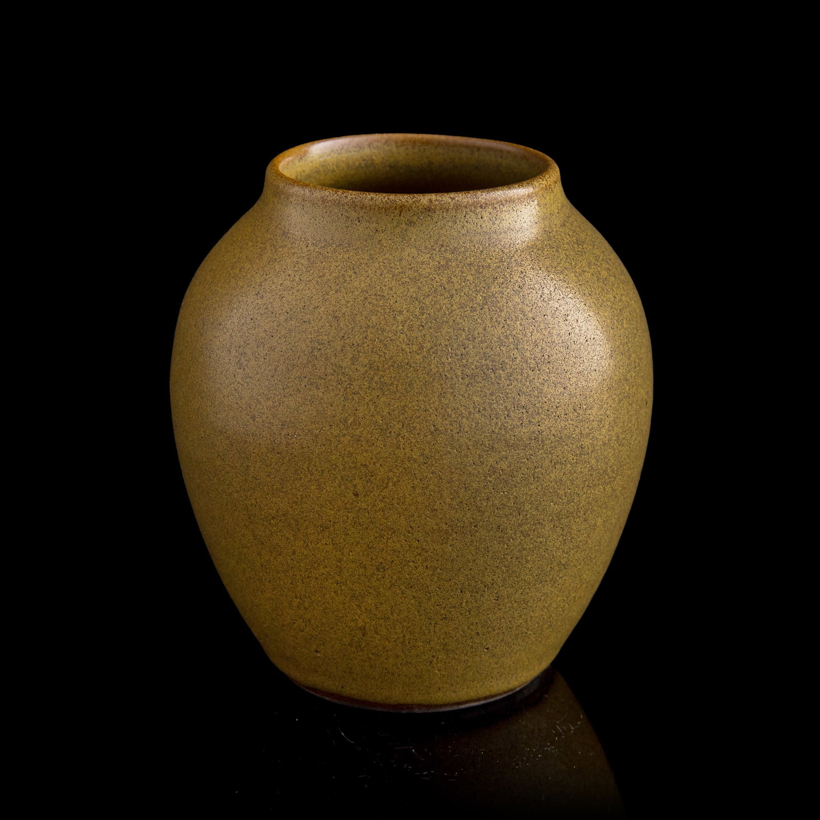 A Chinese tea-dust-glazed jar, 19th century: A Chinese tea-dust-glazed jar 19th century H: 5, Dia: 4 1/2 in. (H: 12.7, Dia: 11.4 cm.) Private collection, Arlington, Virginia. Click here for high resolu