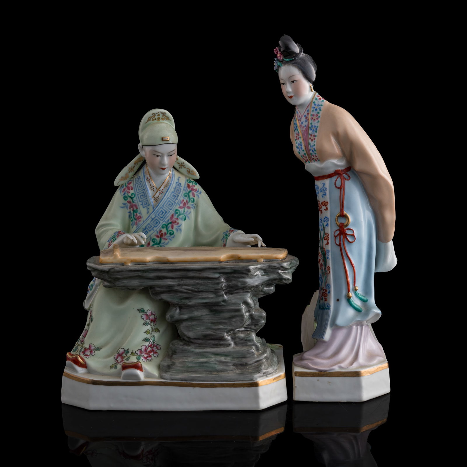 A Chinese famille rose porcelain figure group of The Butterfly Lovers, 1960s-1970s: A Chinese famille rose porcelain figure group of The Butterfly Lovers 1960s-1970s Each with two "si liu" marks to underside. (2). H: 12 1/4, W: 7 5/8, D: 4 3/8 in. (H: 31.1, W: 19.4, D: 11.1 cm. (tall
