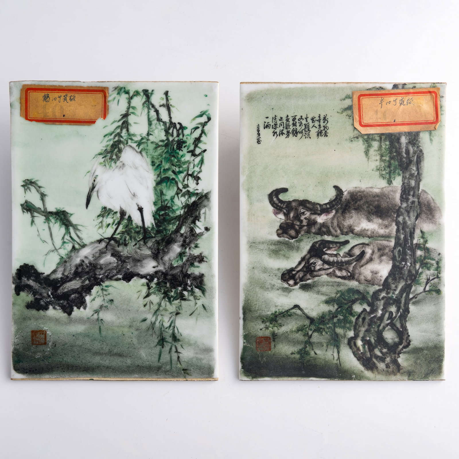 A pair of Chinese famille rose porcelain plaques, Republic period: A pair of Chinese famille rose porcelain plaques Republic period Each with an old label and a seal. (2). H: 10 1/8, W: 7 in. (H: 25.7, W: 17.8 cm. (each)) From Mrs. Houghton, Huntington Beach, Califor