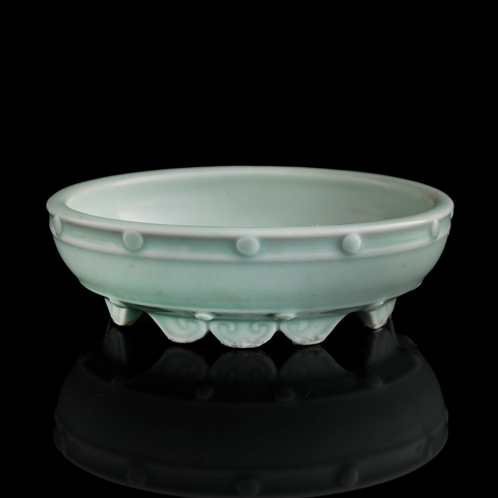 A Chinese celadon-glazed brush washer, Qing dynasty (1 of 8)