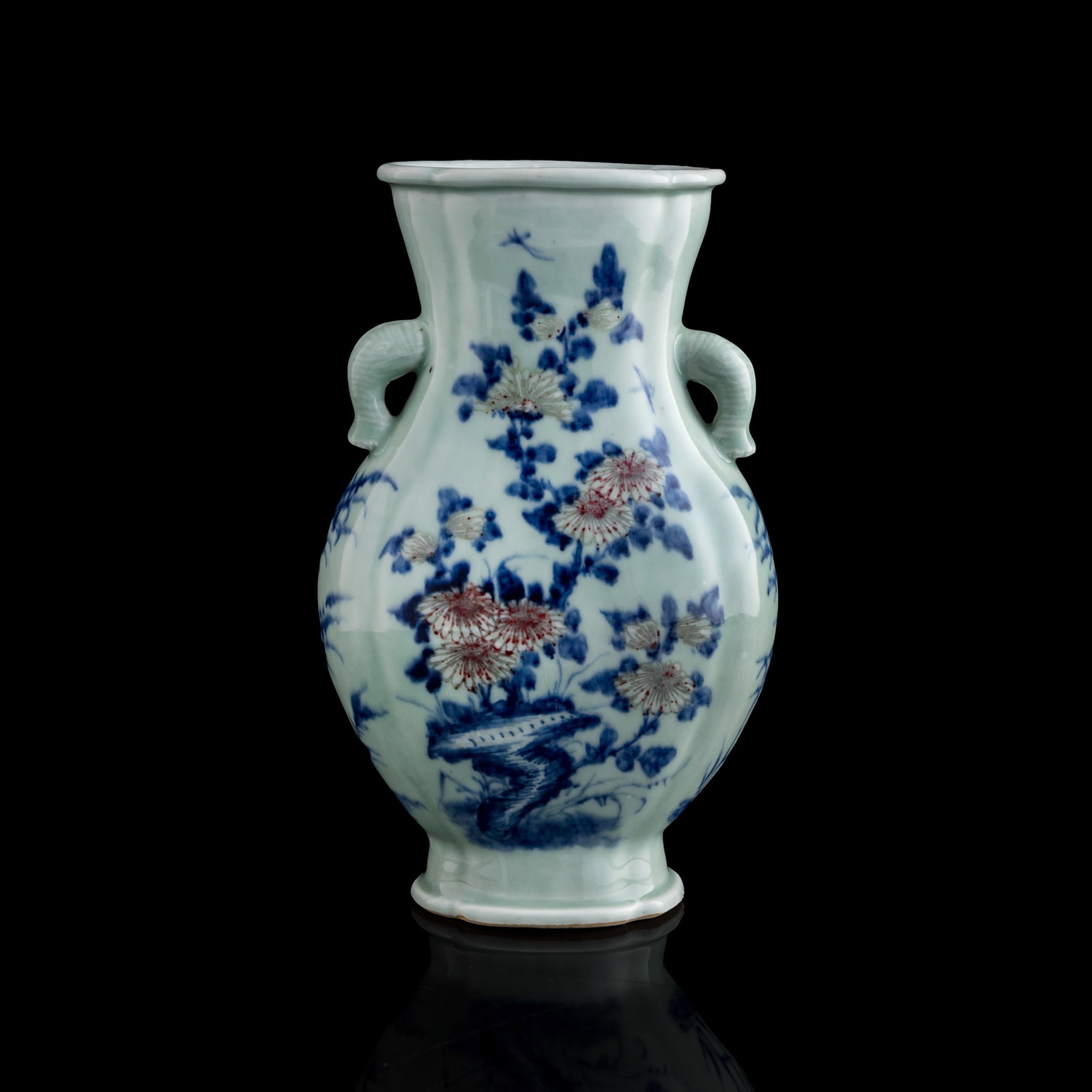 A Chinese blue and copper-red-underglazed vase with elephant handles, 18th century: A Chinese blue and copper-red-underglazed vase with elephant handles 18th century H: 11 1/8, W: 6 3/4, D: 4 1/4 in. (H: 28.3, W: 17.1, D: 10.8 cm.) From Mrs. Chan, San Francisco, California; acquired 