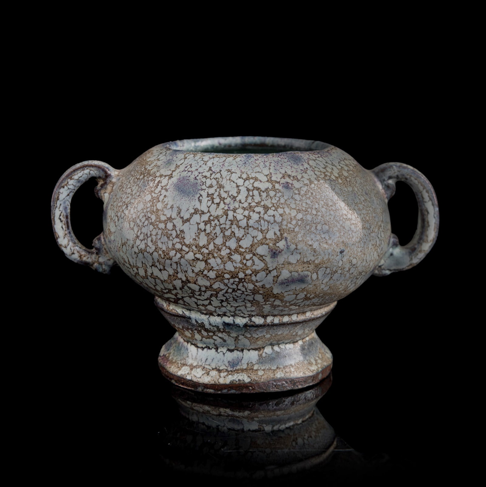 A Chinese Shiwan censer, Qing dynasty: A Chinese Shiwan censer Qing dynasty With an old label to underside. H: 3 3/4, W: 6 1/4, D: 4 5/8 in. (H: 9.5, W: 15.9, D: 11.7 cm.) Private collection, Irvine, California.