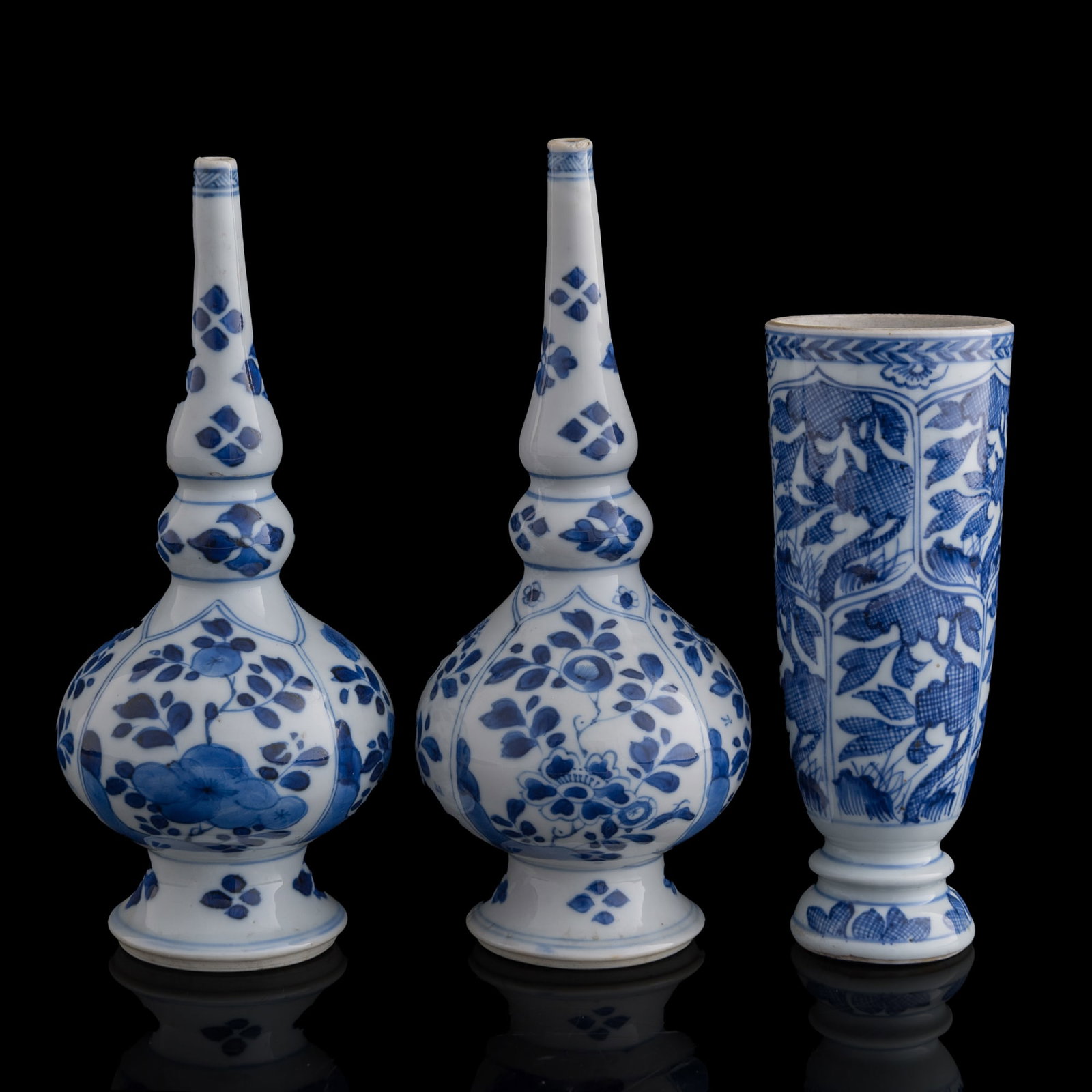 A pair of Chinese export blue and white vases and a wine cup, Kangxi period, Qing dynasty (1 of 9)