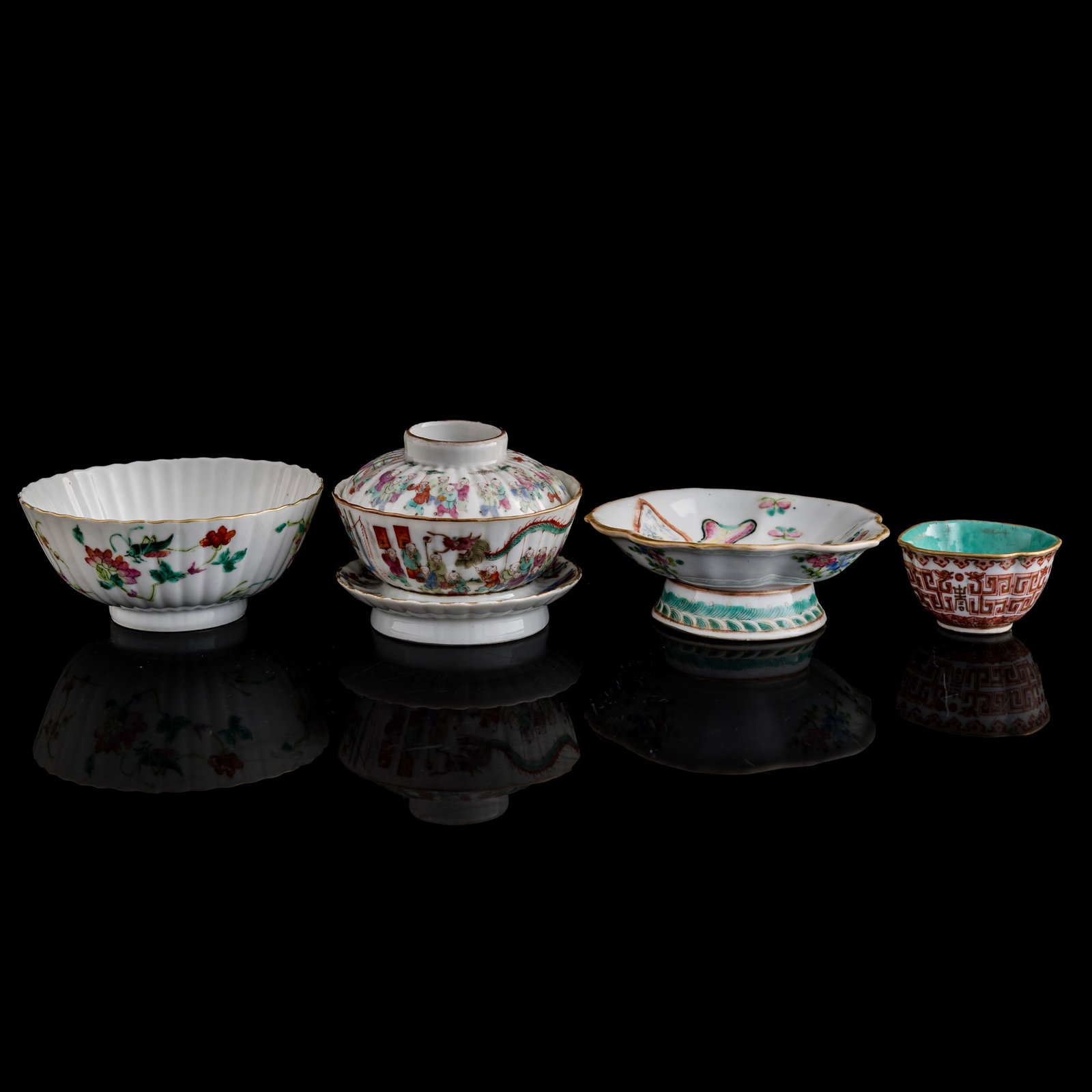 Four assorted Chinese famille rose porcelain ware, 19th century: Four assorted Chinese famille rose porcelain ware 19th century The underside of two bowls and a lid with four-character mark, the other two with six-character mark to underside. (4). H: 2 1/4, Dia: 5 